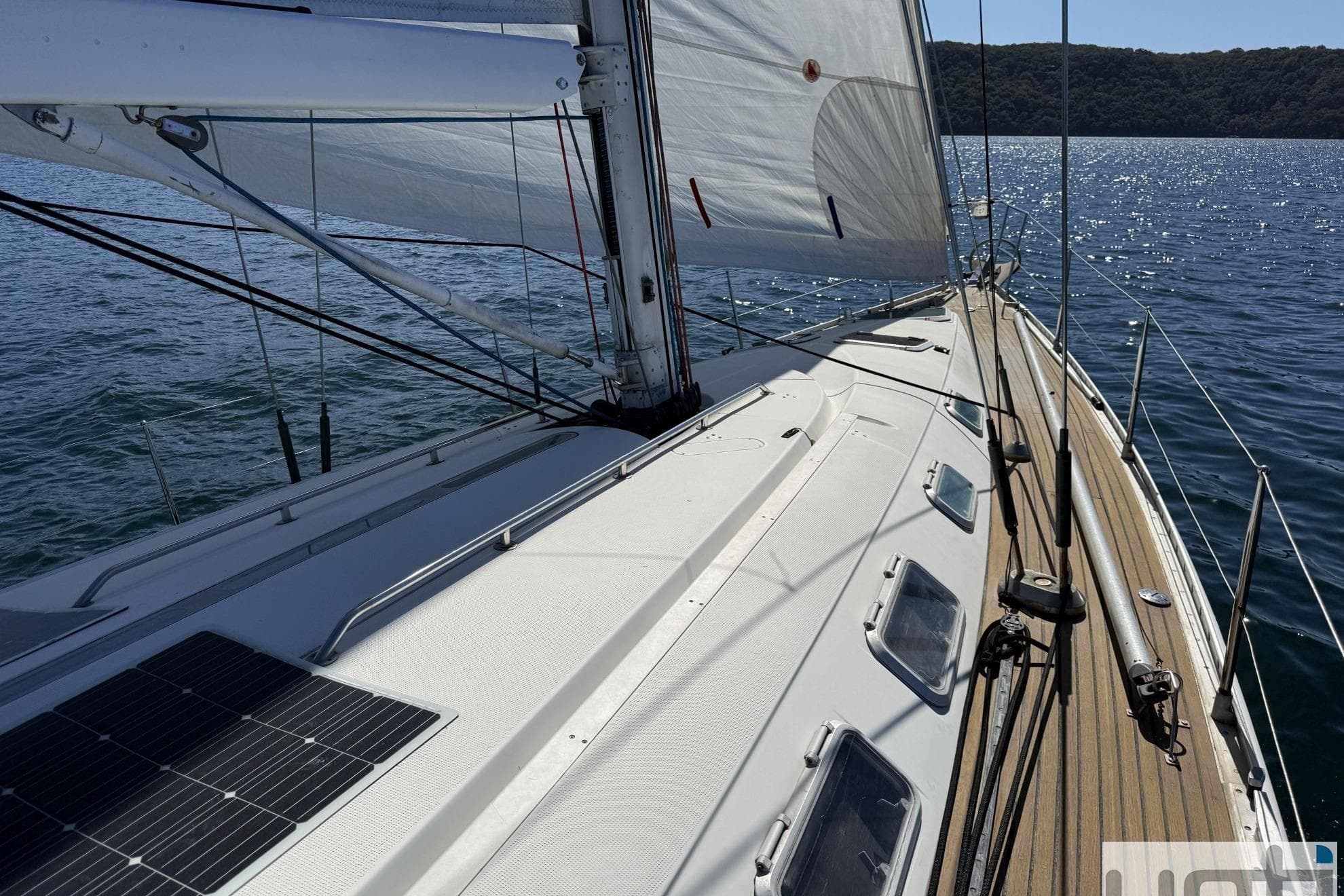 Sailing yacht Beneteau First 53f5, 1991 model, cruising on calm waters.