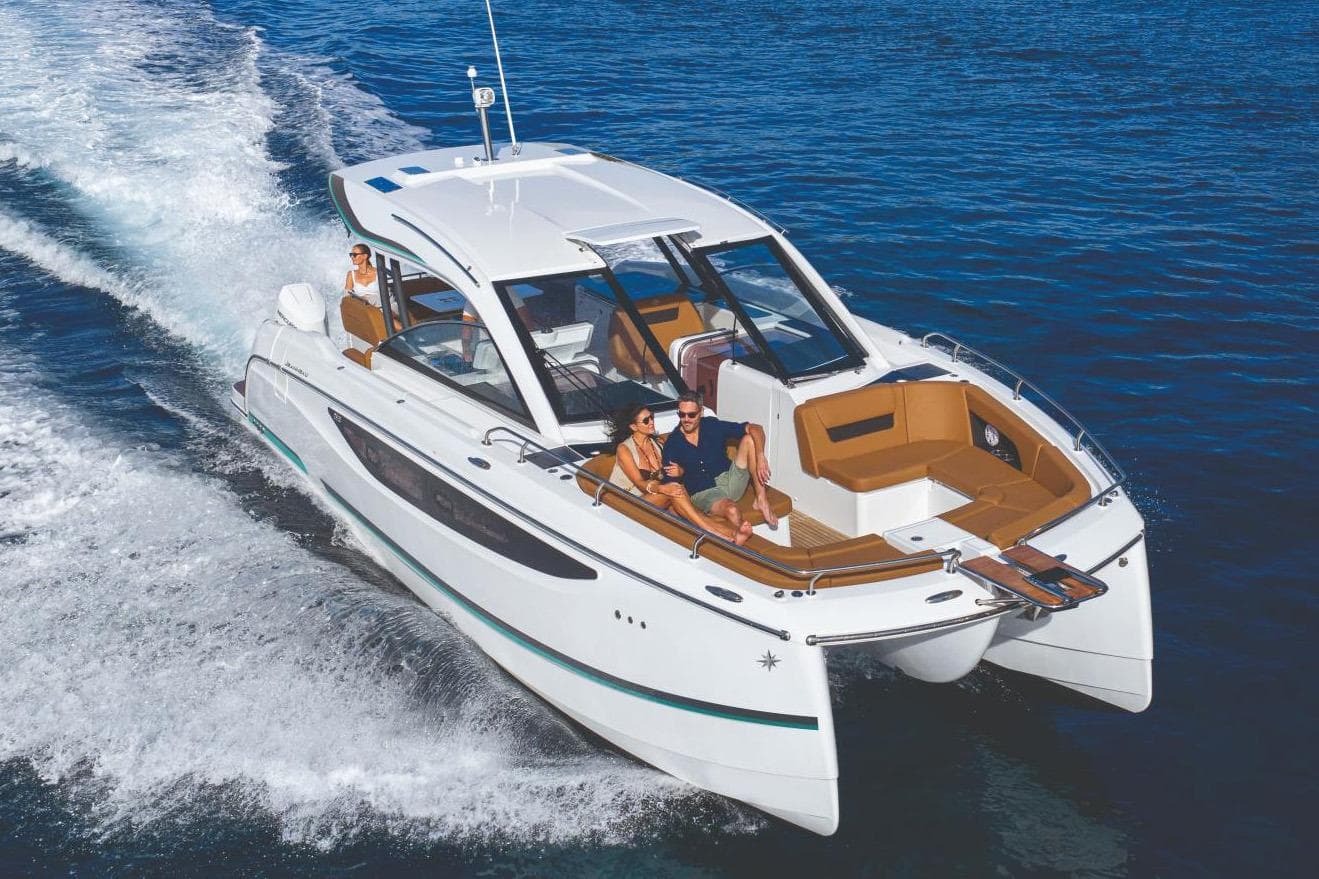 Manufacturer Provided Image: 2026 Jeanneau TH38 cruising on open water with passengers enjoying the ride.