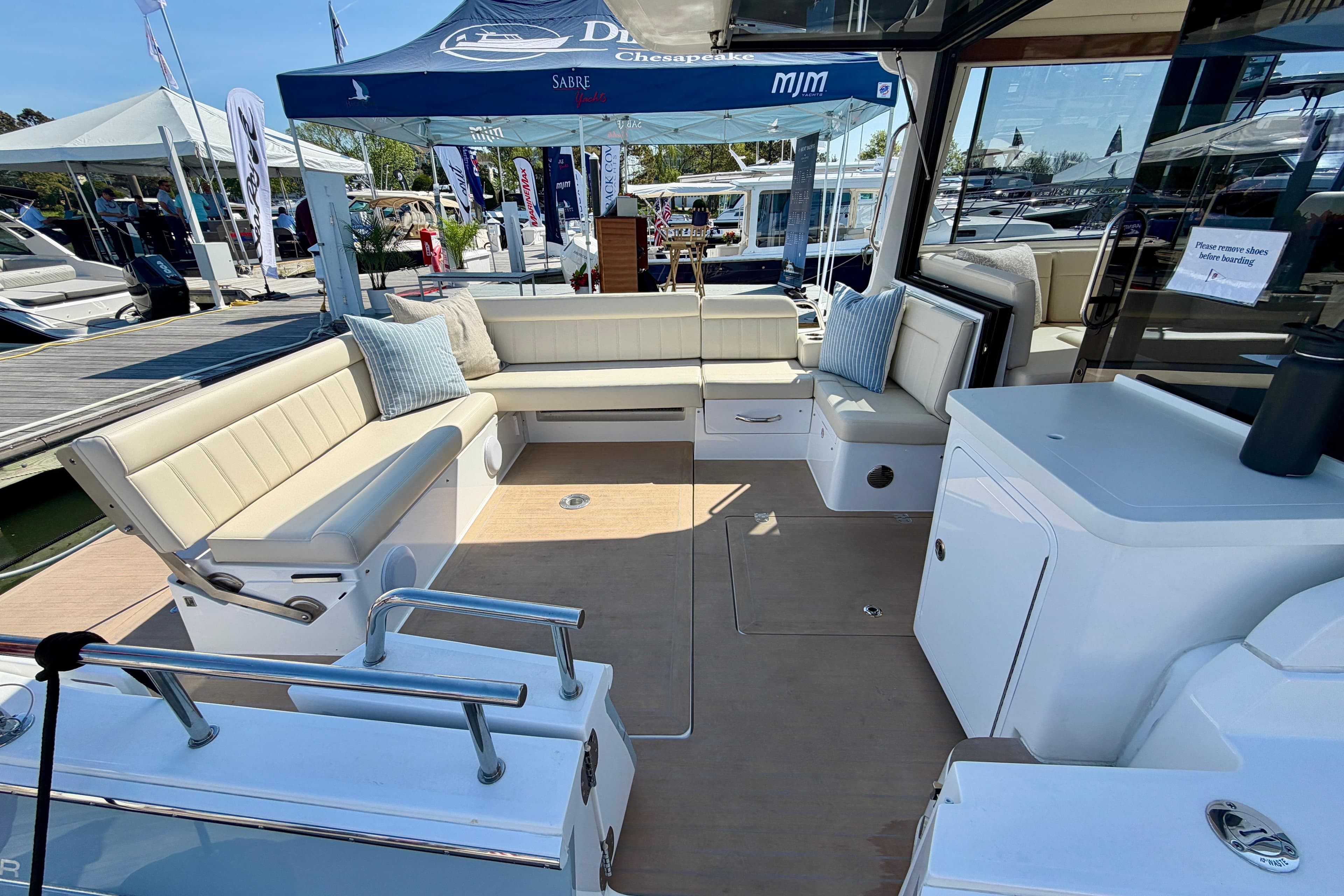 Luxurious seating area on the 2026 MJM 47 R yacht, showcasing modern design.