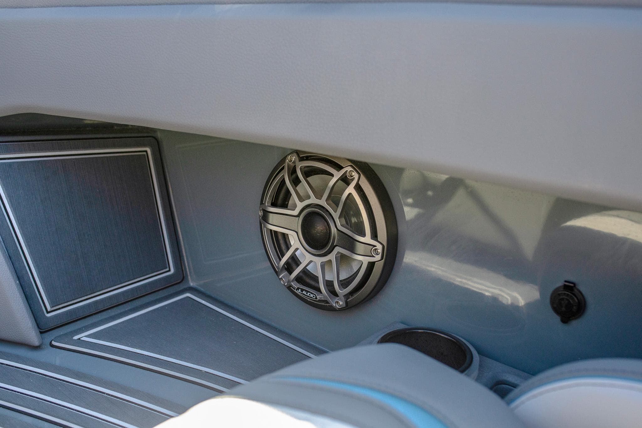2024 MTI 390X boat interior with speaker and sleek design elements.