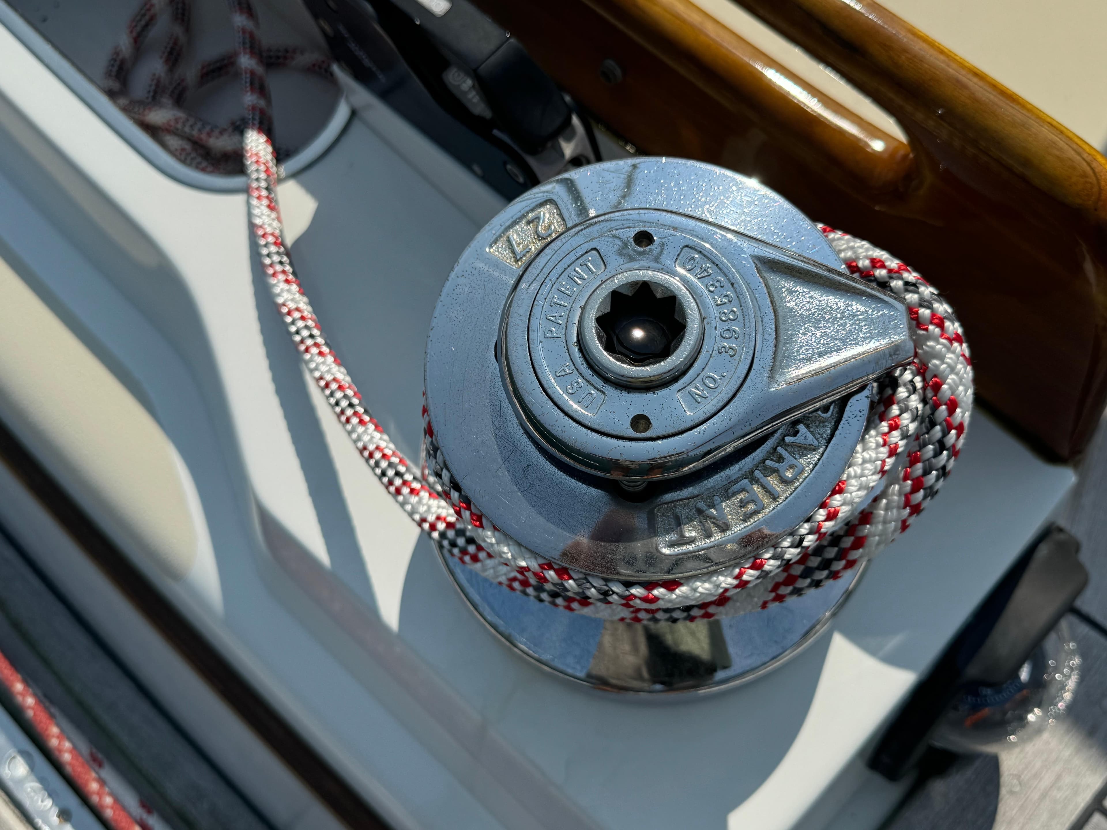 Winch on 1986 Little Harbor 46 Center Cockpit sailboat with rope detail.