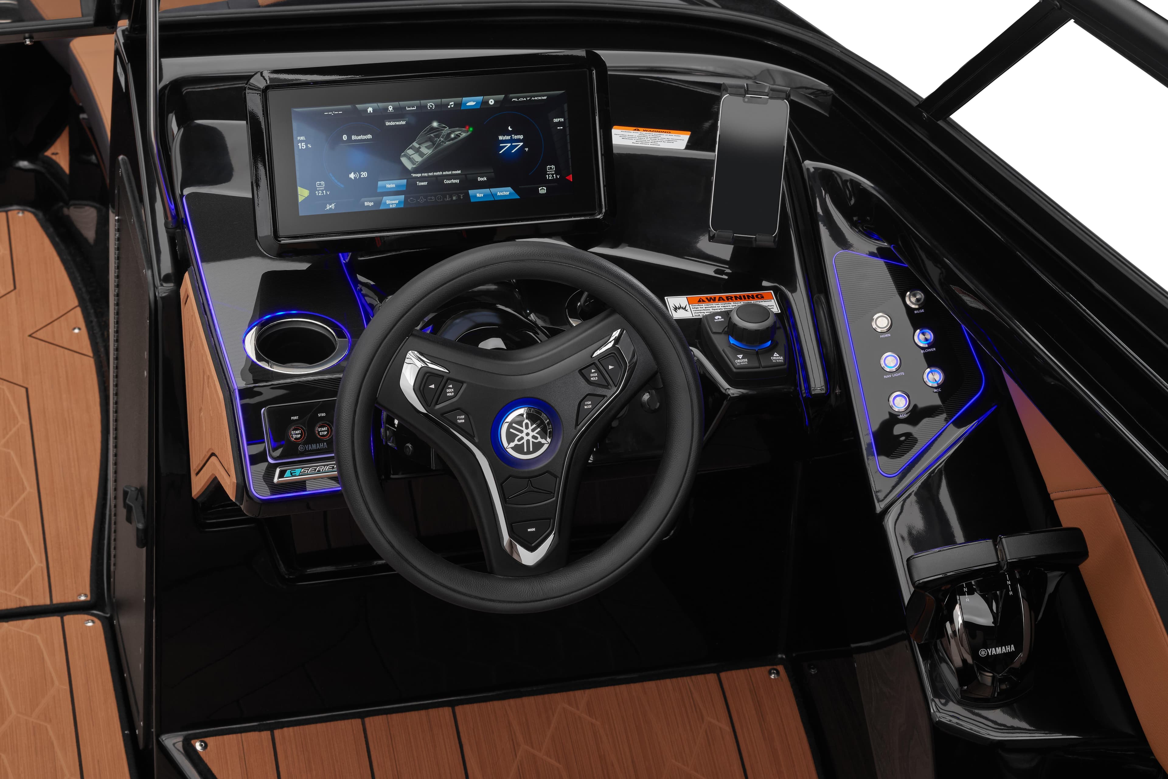 2026 Yamaha Boats 255XD dashboard with advanced touchscreen and sleek steering wheel design.