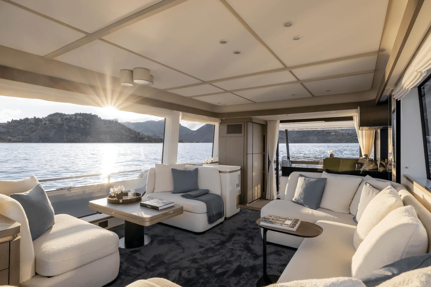 Luxurious interior of 2025 Azimut Magellano 60 yacht with scenic ocean view.