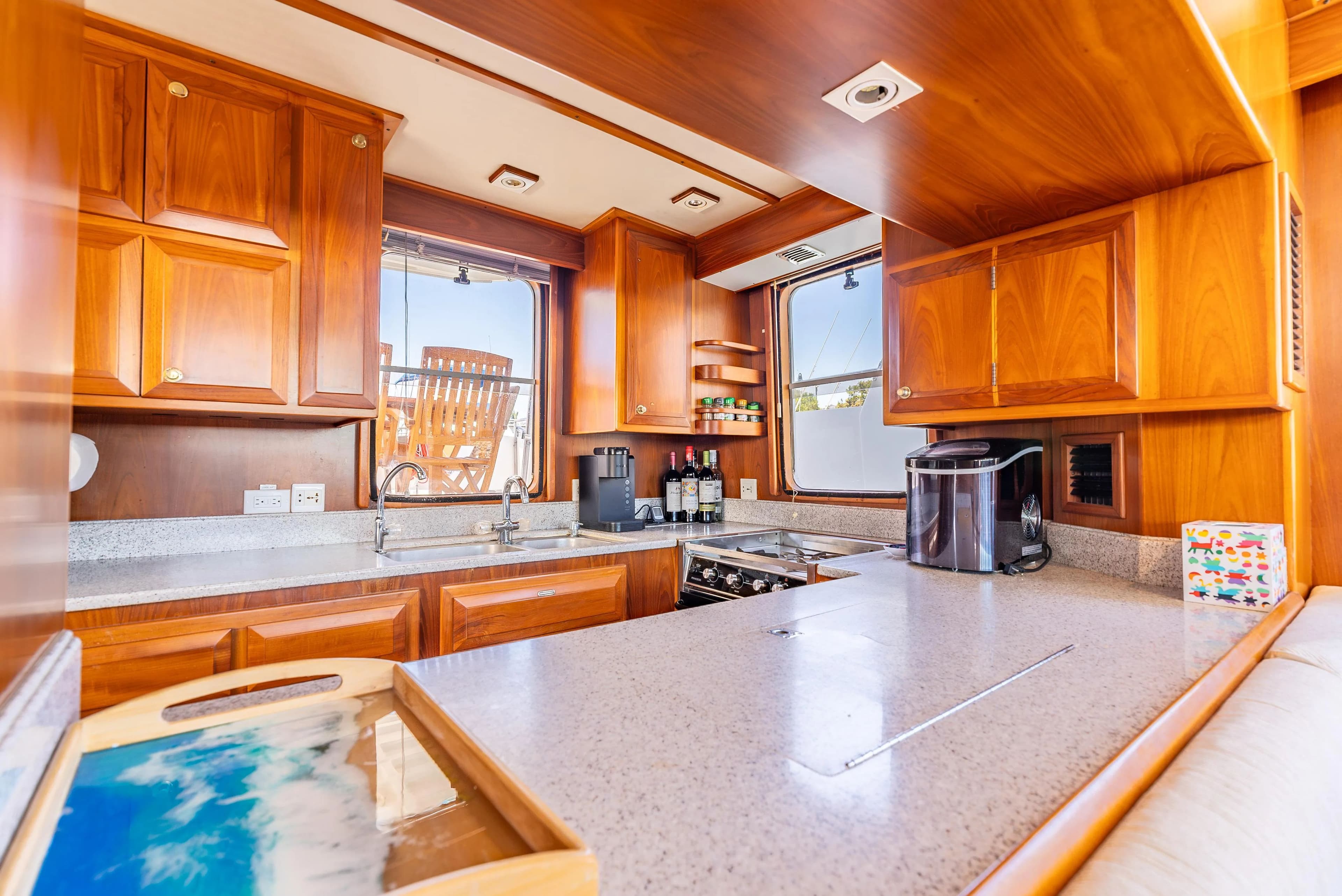Interior of 2009 DeFever 45 Motoryacht featuring modern kitchen.