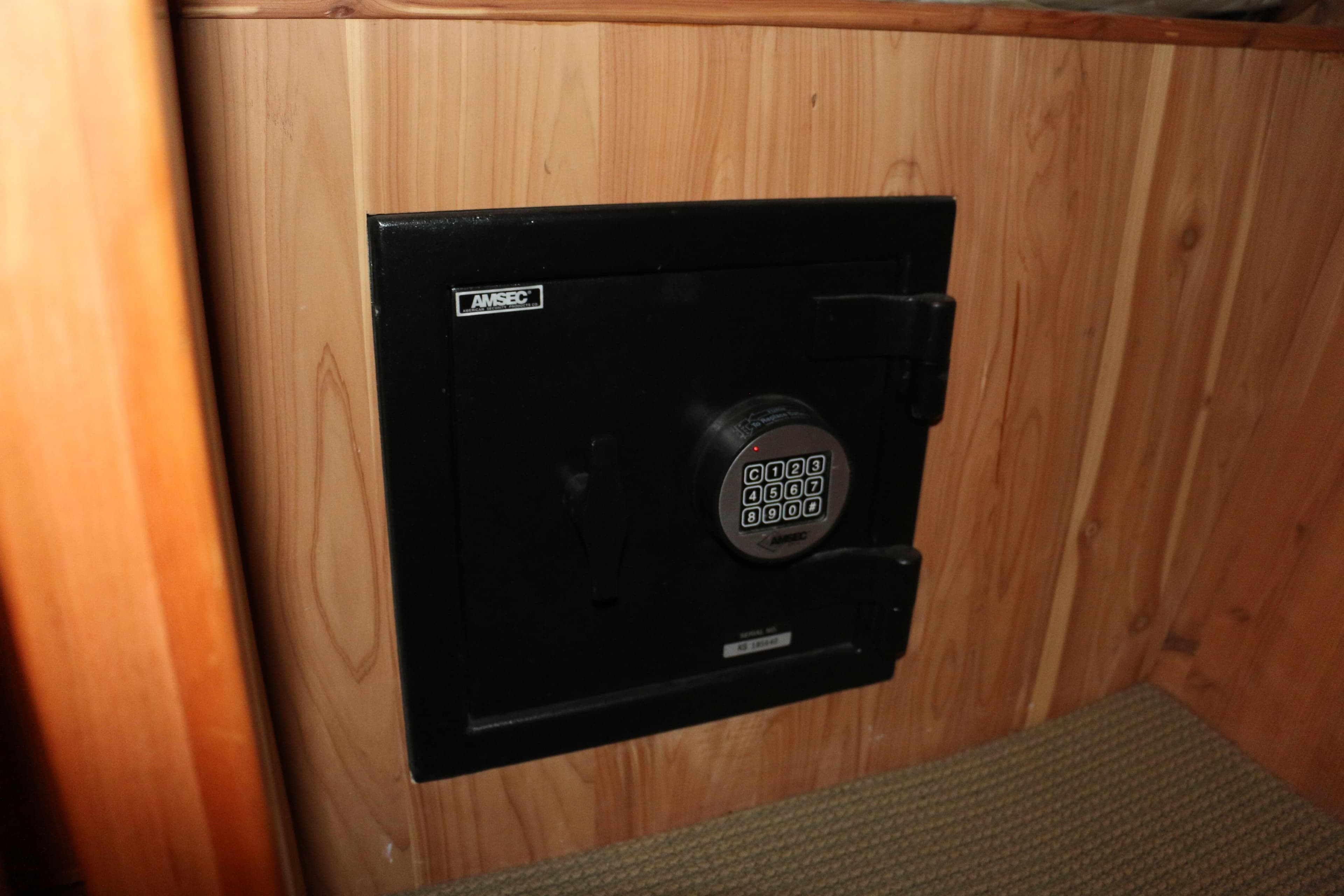 Secure safe with digital keypad in 2004 West Bay 68 Sonship Pilothouse interior.