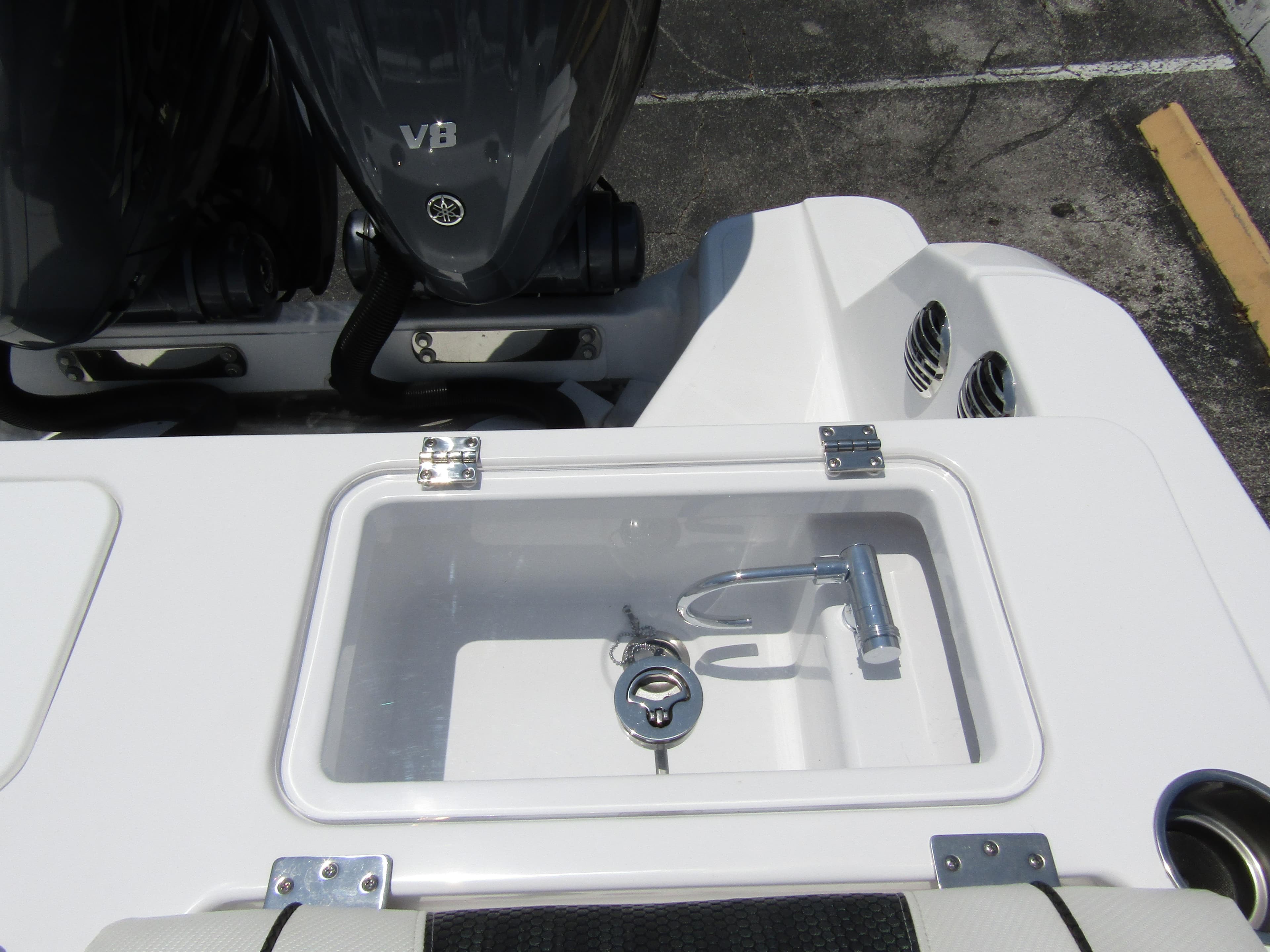 2024 Wellcraft 352 Fisherman boat with dual outboard engines and livewell.