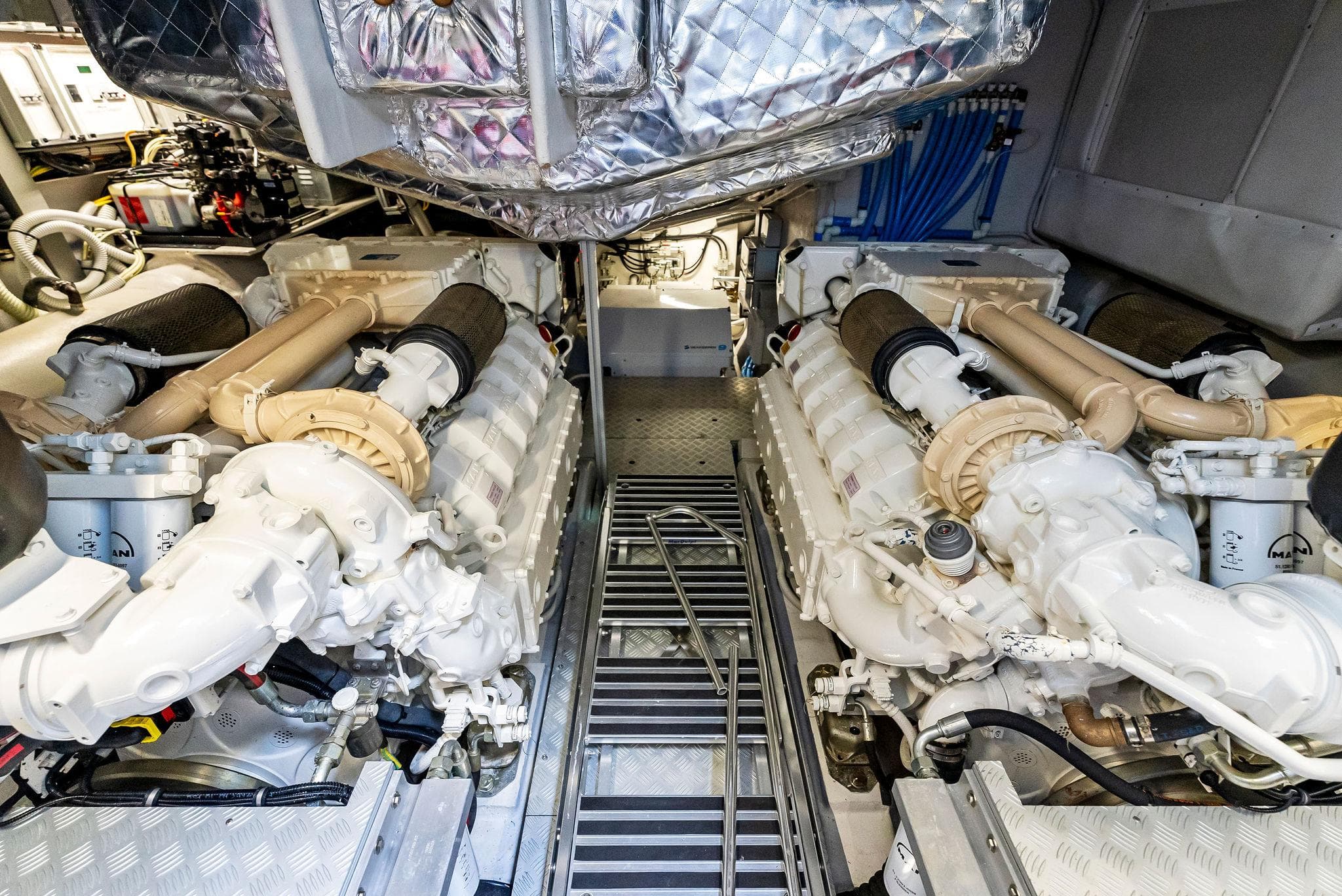 Engine room of a 2020 Riva 66' Ribelle yacht with twin engines.