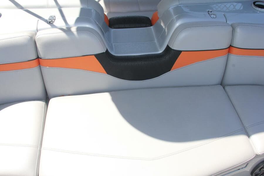 2021 Berkshire 25 Sport CL boat interior with gray and orange seating.
