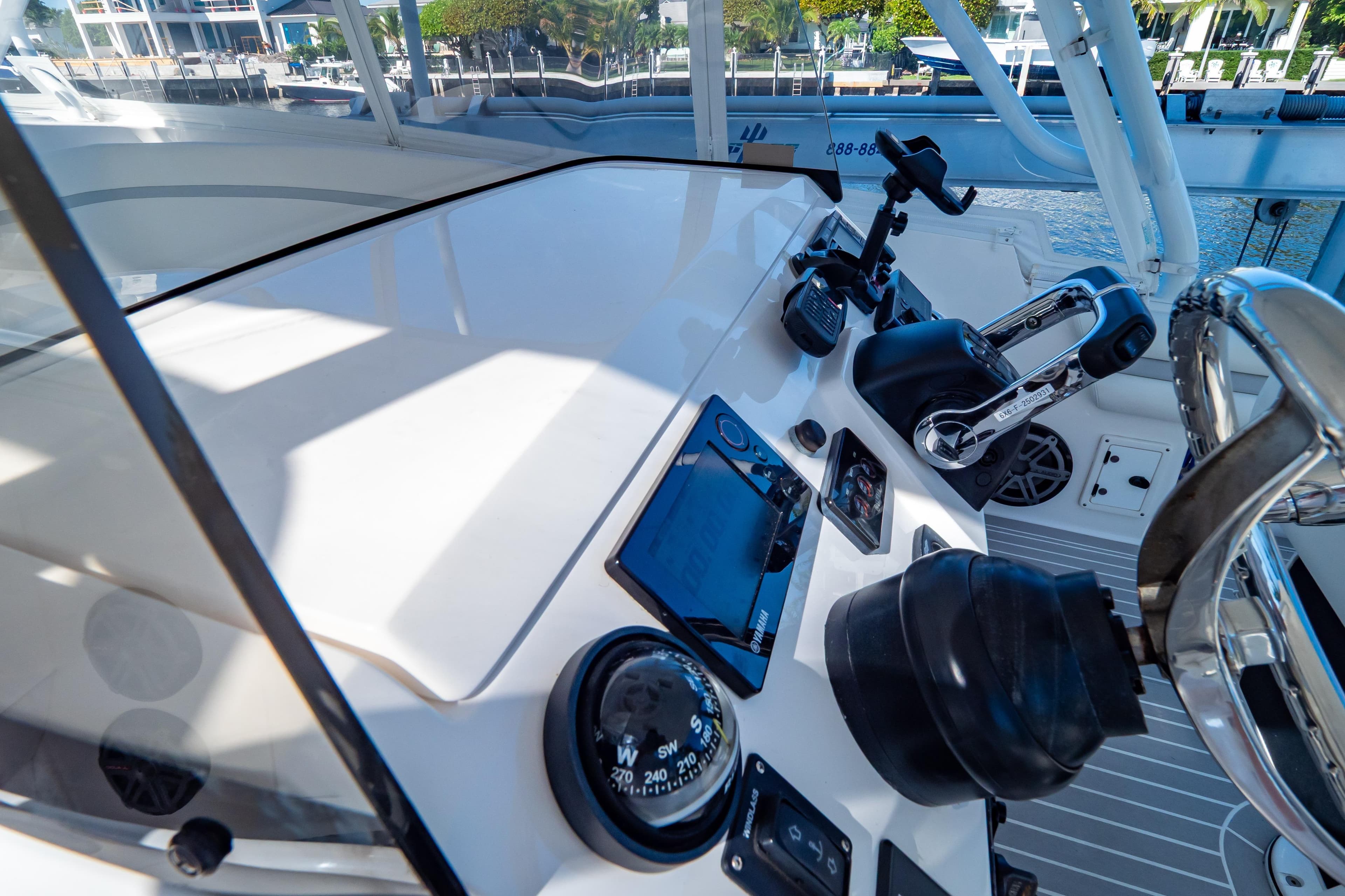 Helm of 2016 Intrepid 400 Cuddy with navigation instruments and controls.