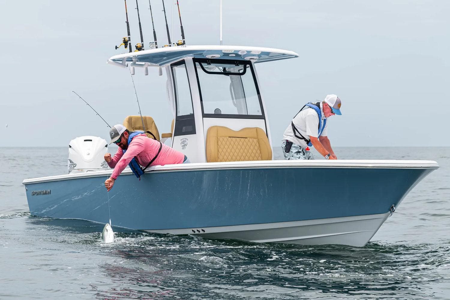 Manufacturer Provided Image: 2025 Sportsman Masters 267 Bay Boat with anglers fishing in open water.