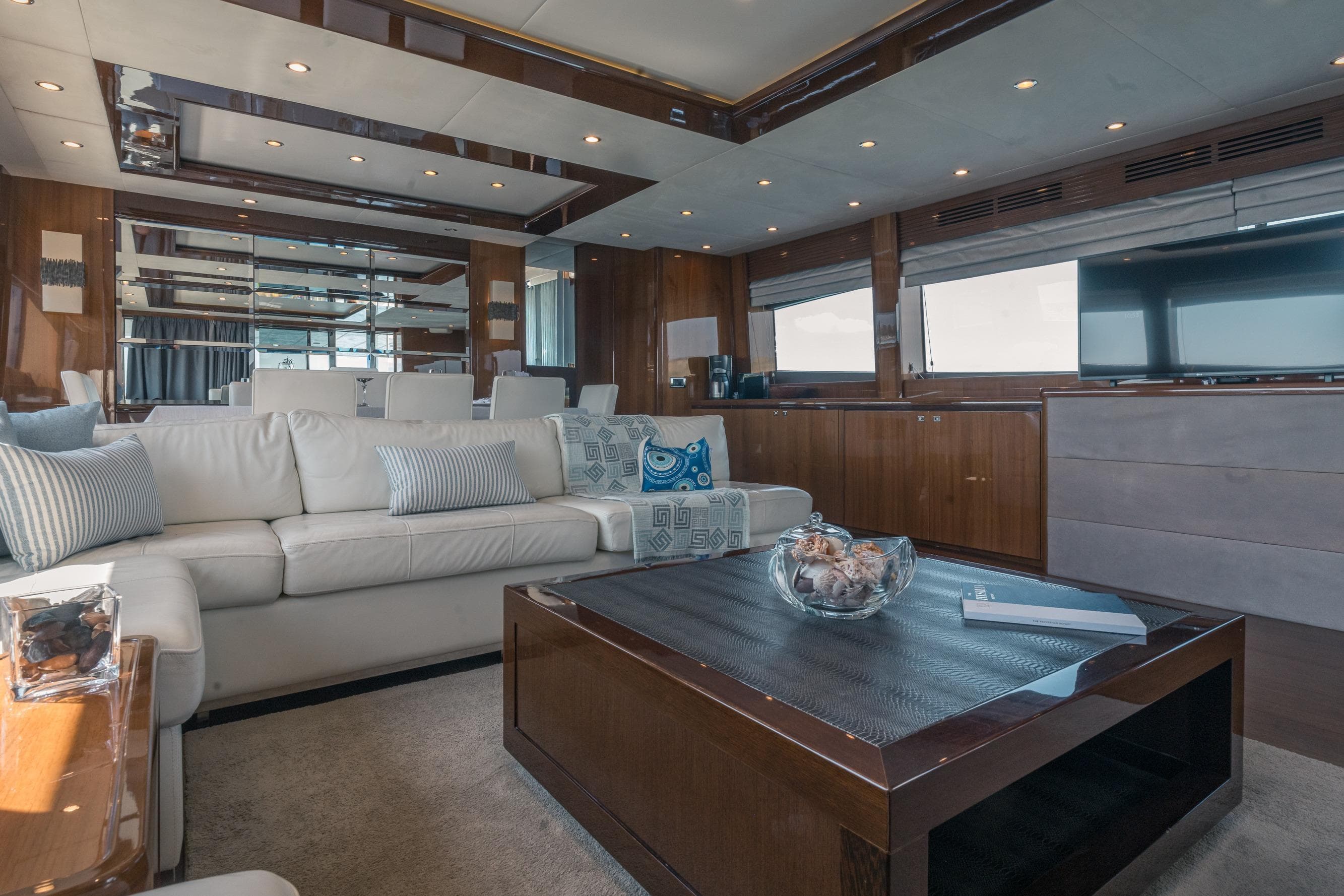 Luxurious interior of 2012 Princess 85 Motor Yacht with elegant seating and modern decor.