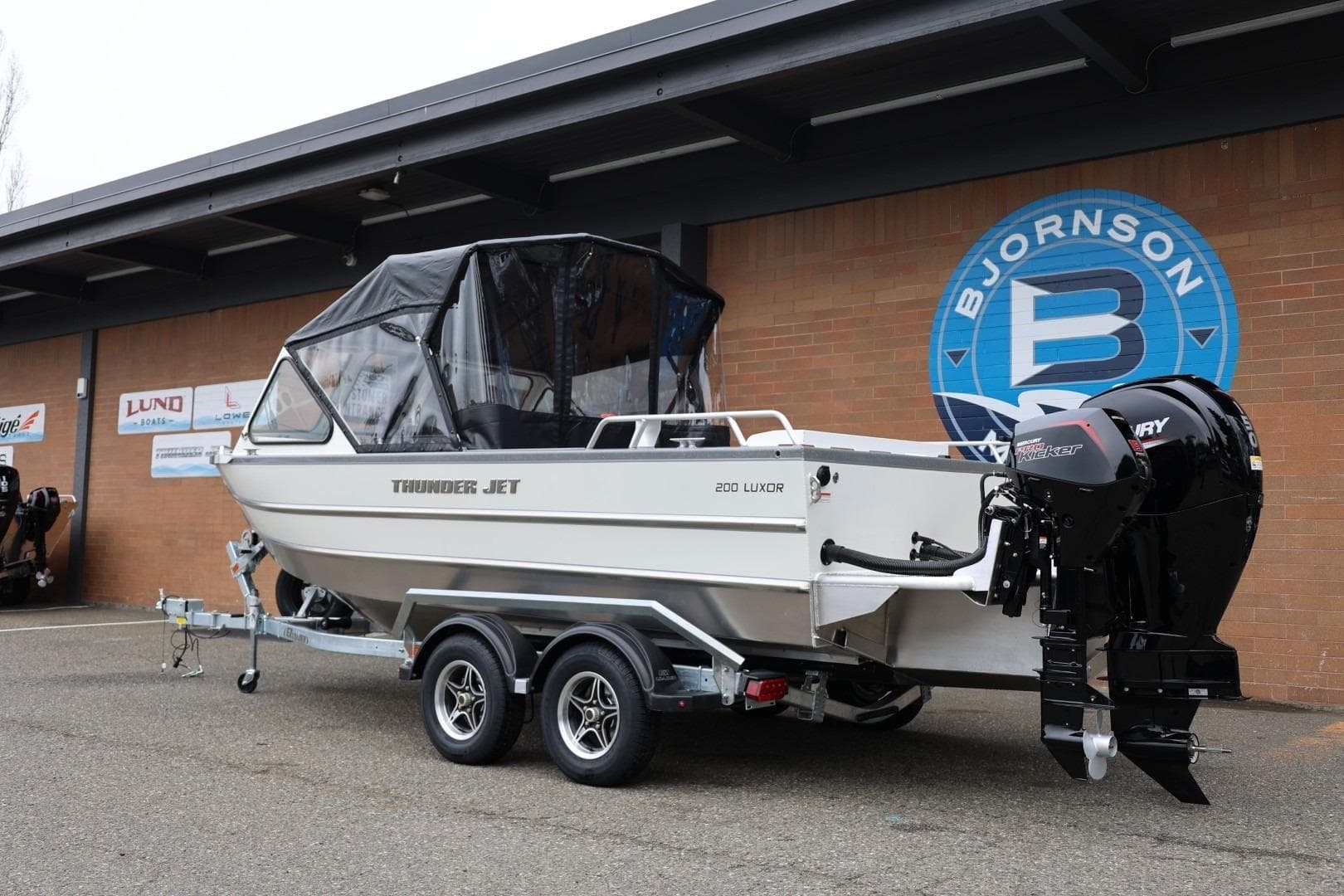 2026 Thunder Jet 200 Luxor boat on trailer outside Bjornson dealership.