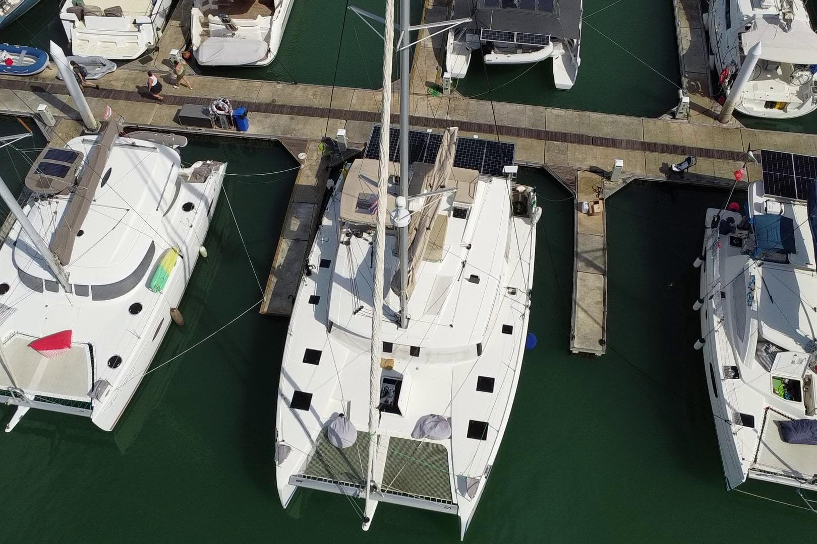 Aerial view of 2021 Fountaine Pajot Saona 47 catamaran docked at marina.