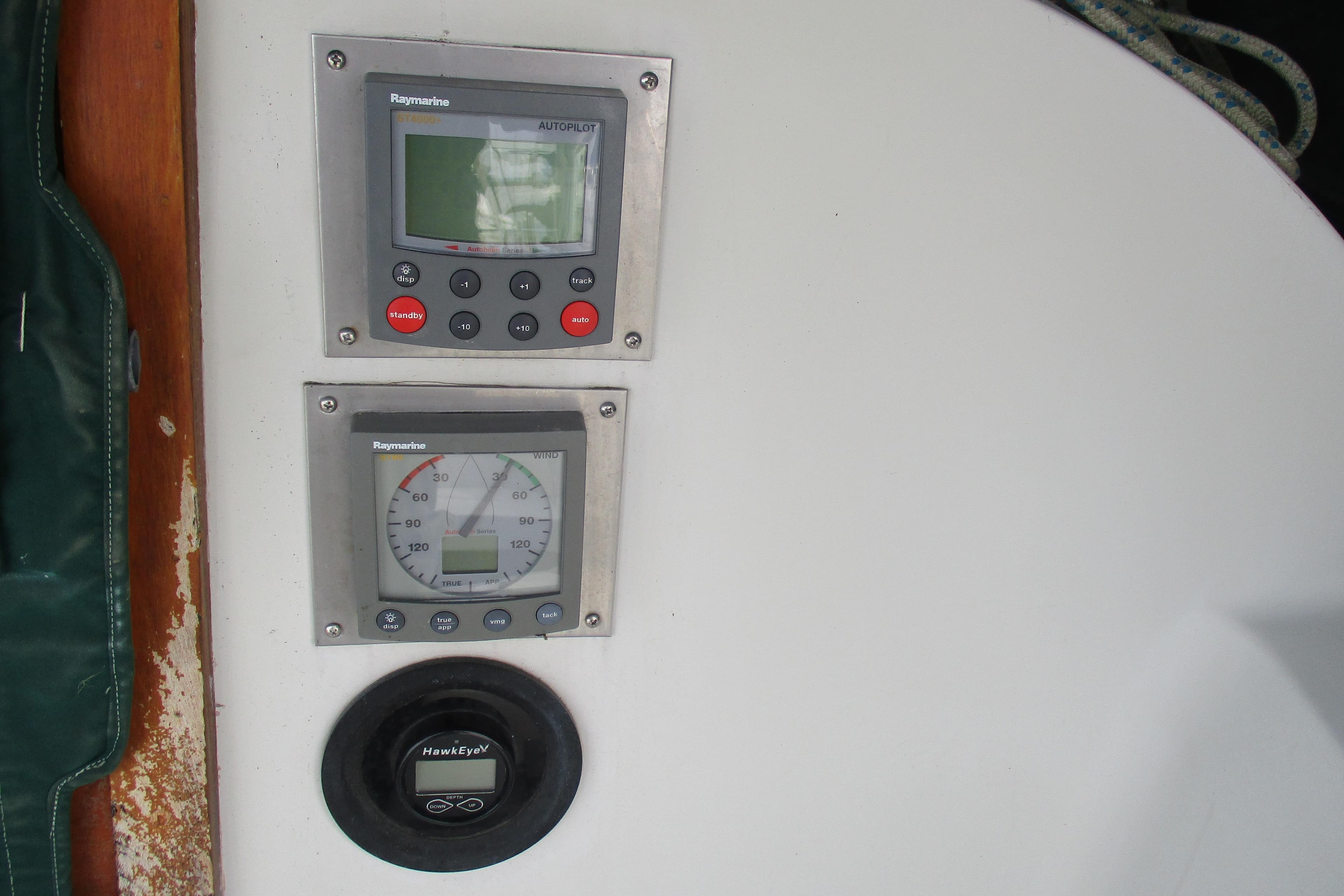 Raymarine autopilot and wind instruments on 1981 C & C 32 sailboat dashboard.