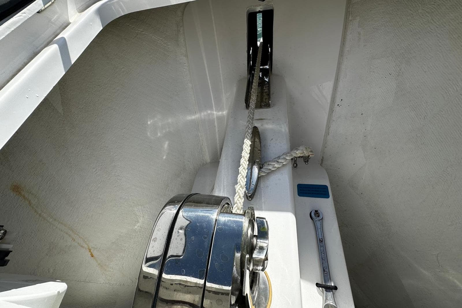 Anchor locker of 2024 Southport 30 FE boat with rope and winch.
