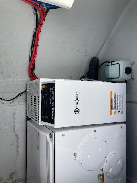 Cummins Onan generator in a 2018 Lagoon 450 yacht engine room.
