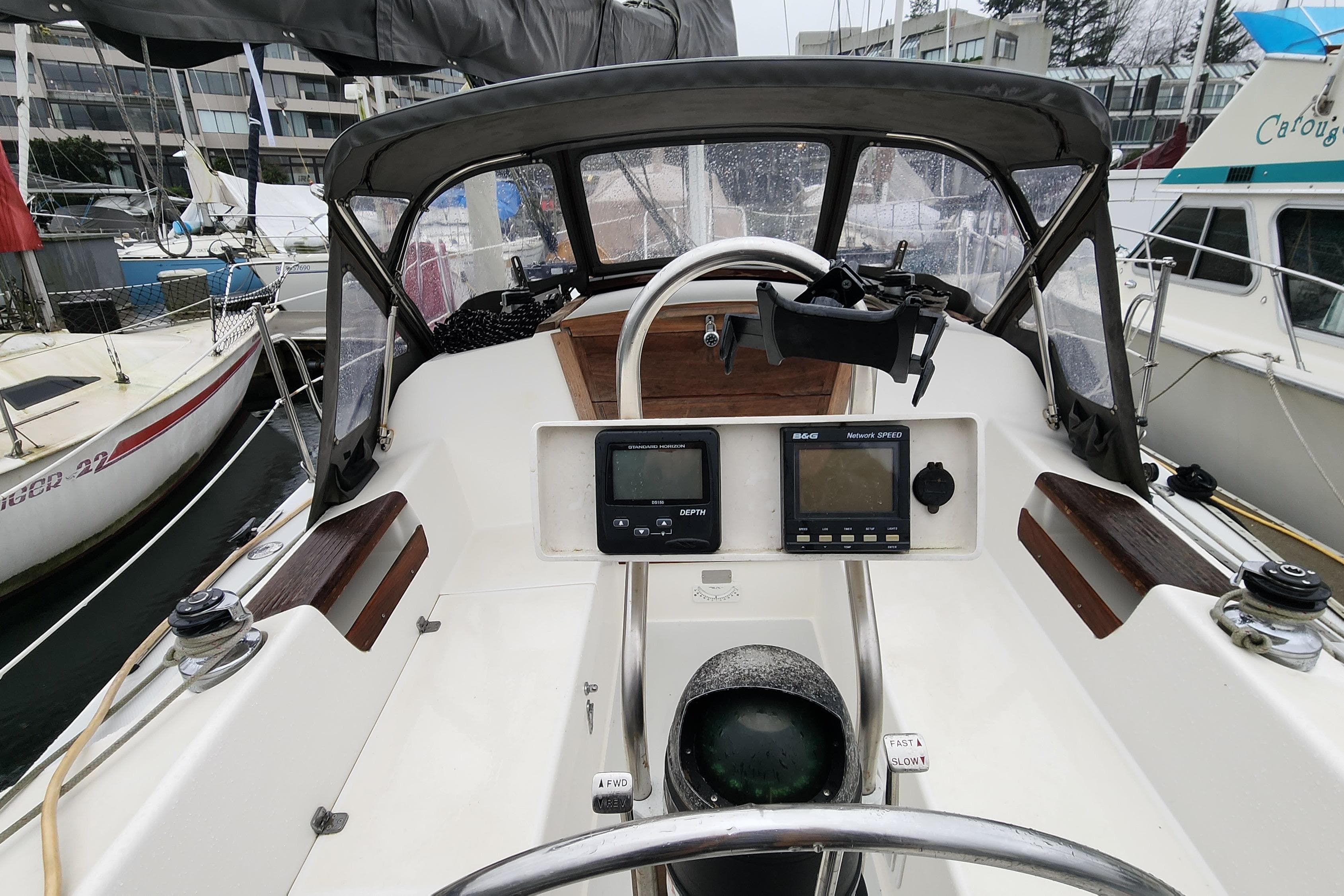 Cockpit view of a 1992 Catalina 28 MkII sailboat with navigation instruments.
