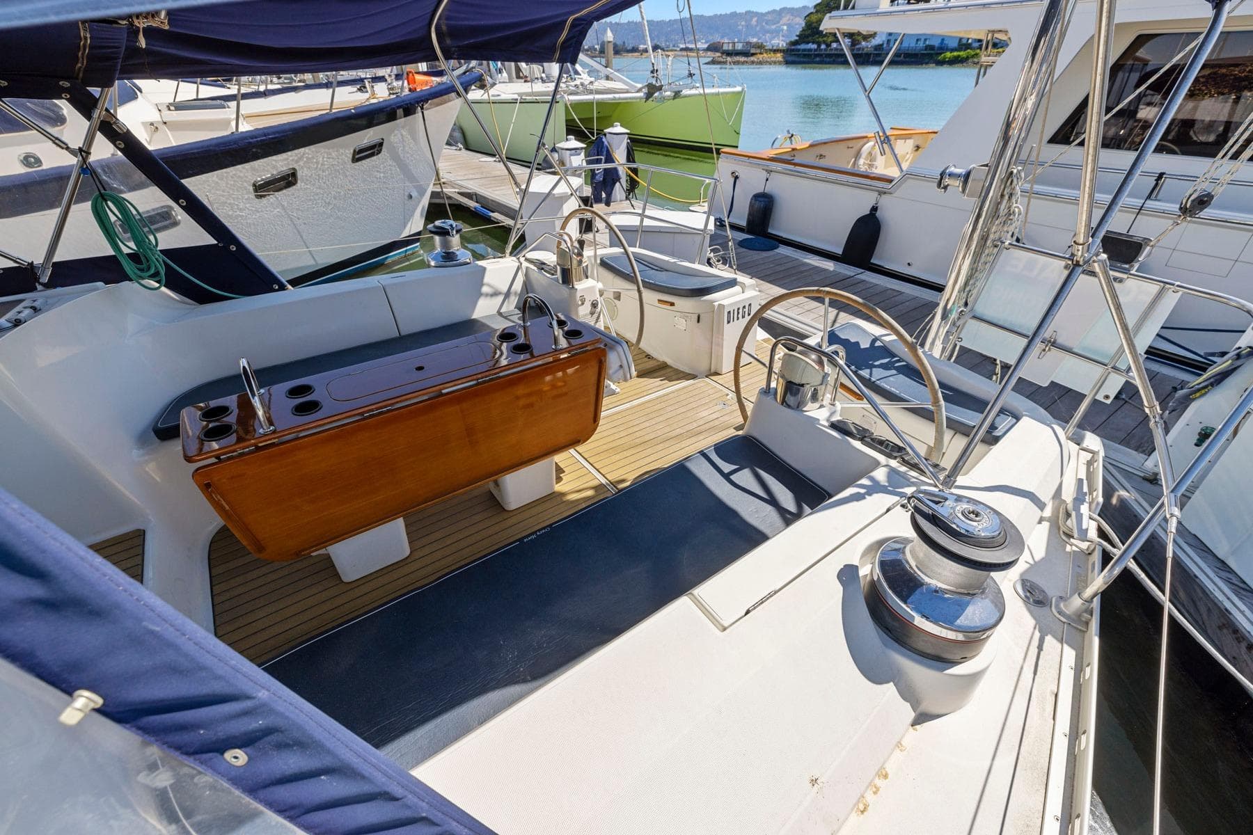 Cockpit of 2001 Jeanneau Sun Odyssey 52.2 sailboat docked at marina.