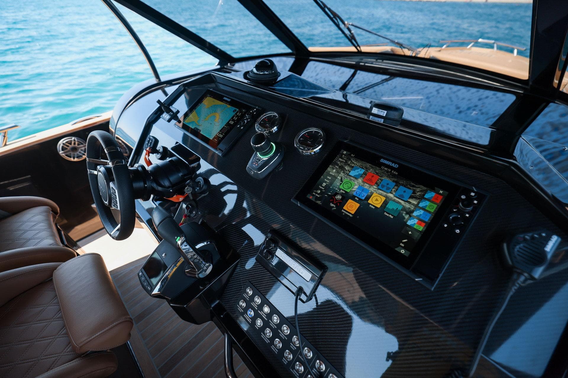 Cockpit of 2025 Focus Forza 37 yacht with advanced navigation systems and luxurious seating.