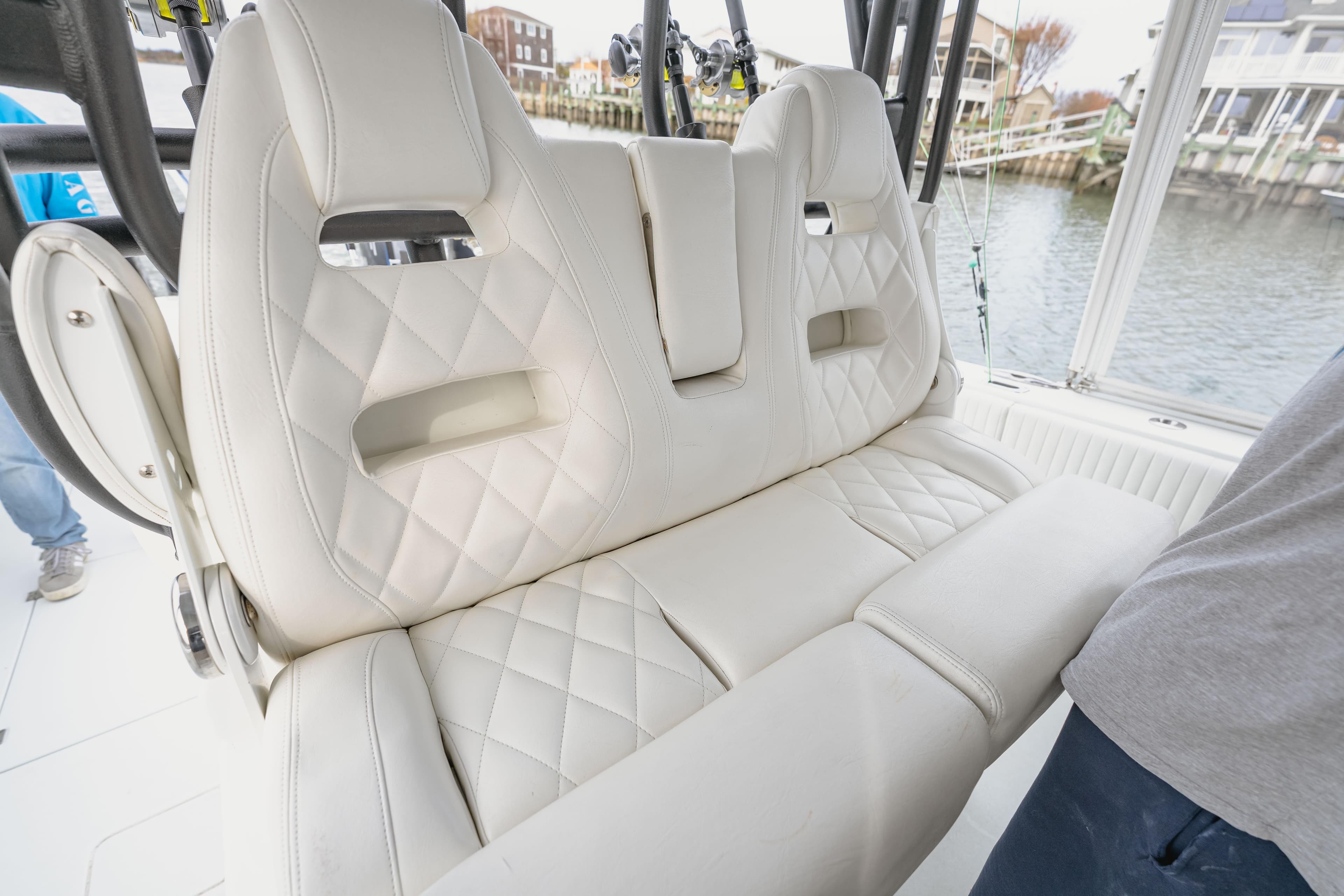 Luxurious white leather seating on a 2018 Freeman 37 VH boat interior.