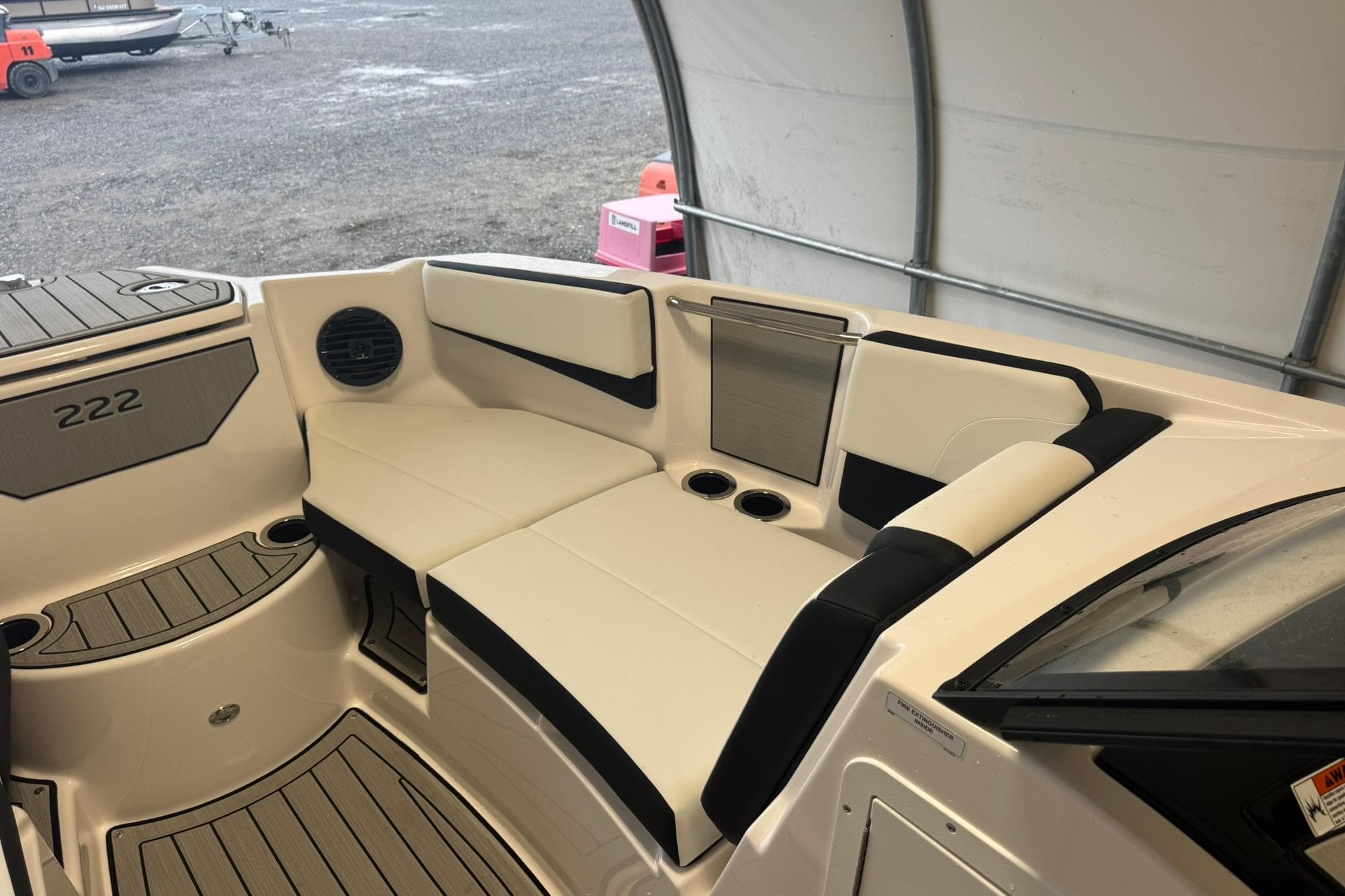 2026 Yamaha Boats 222SD interior seating with cup holders and sleek design.