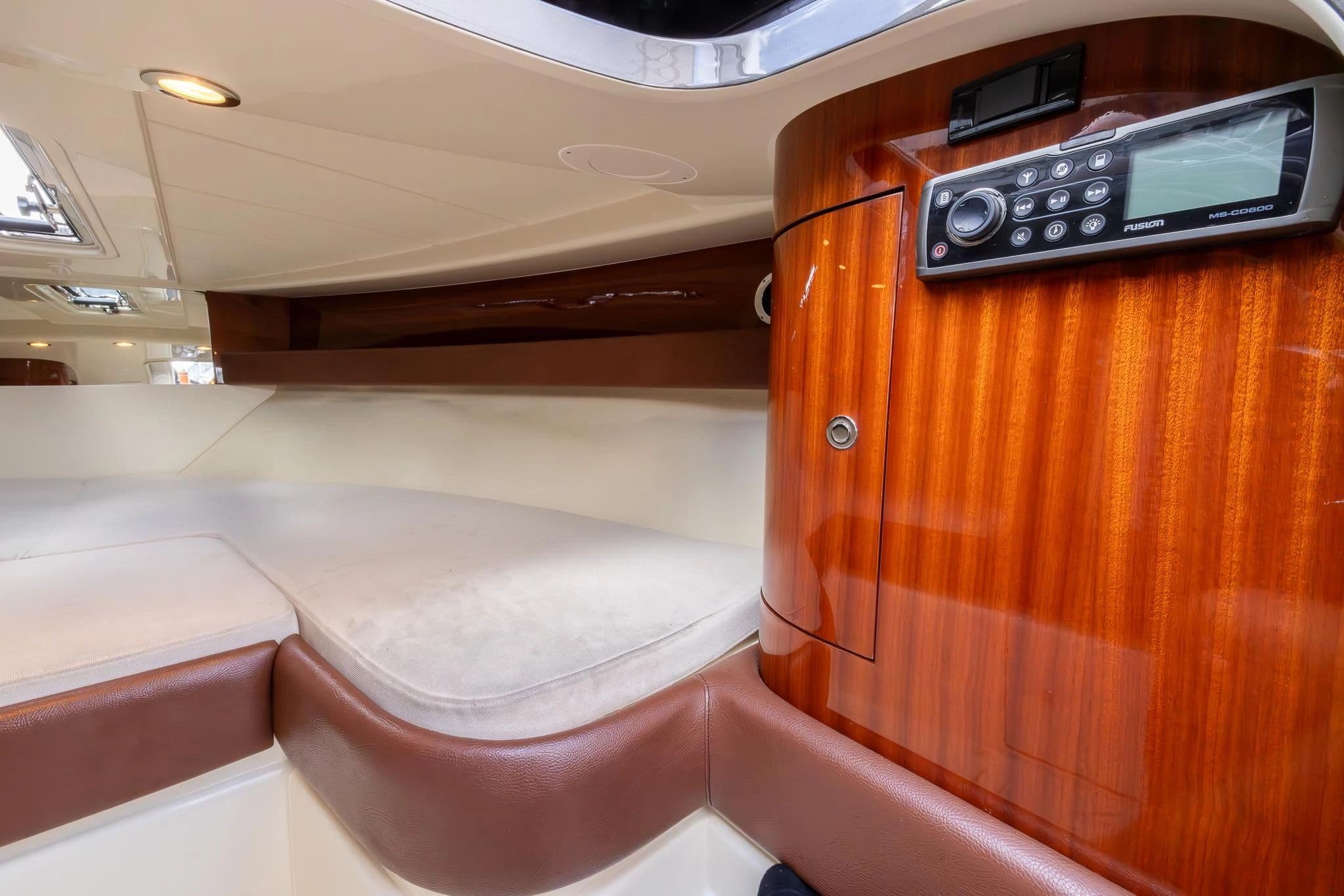 Interior of 2013 Riva 33' Aquariva Super with wood finish.