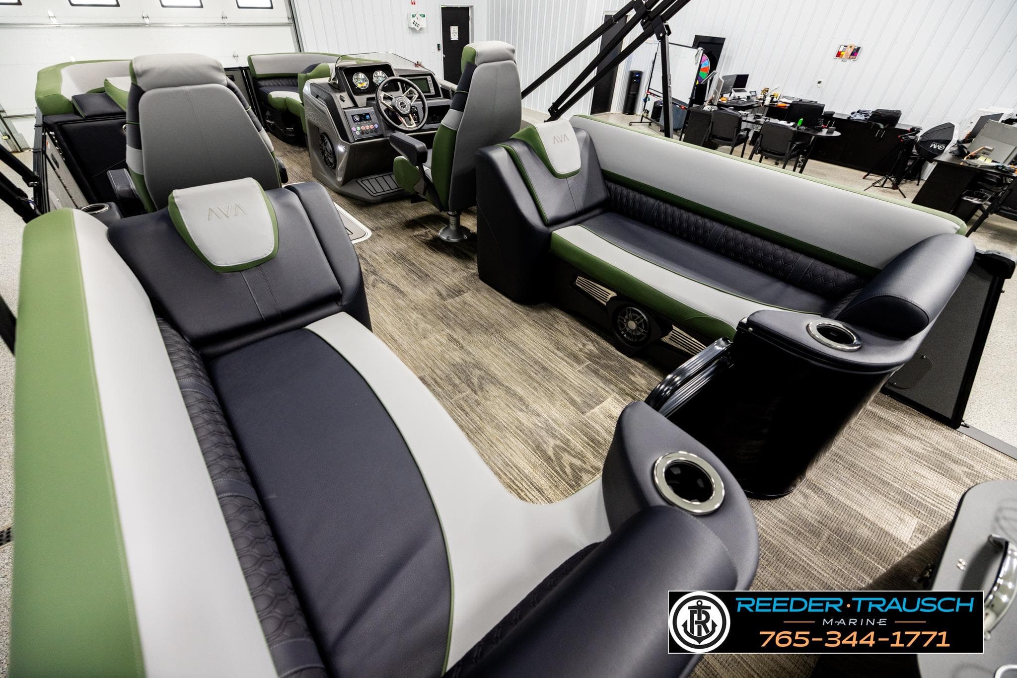 Luxurious interior of 2026 Avalon CAT QL boat with plush seating and modern dashboard.