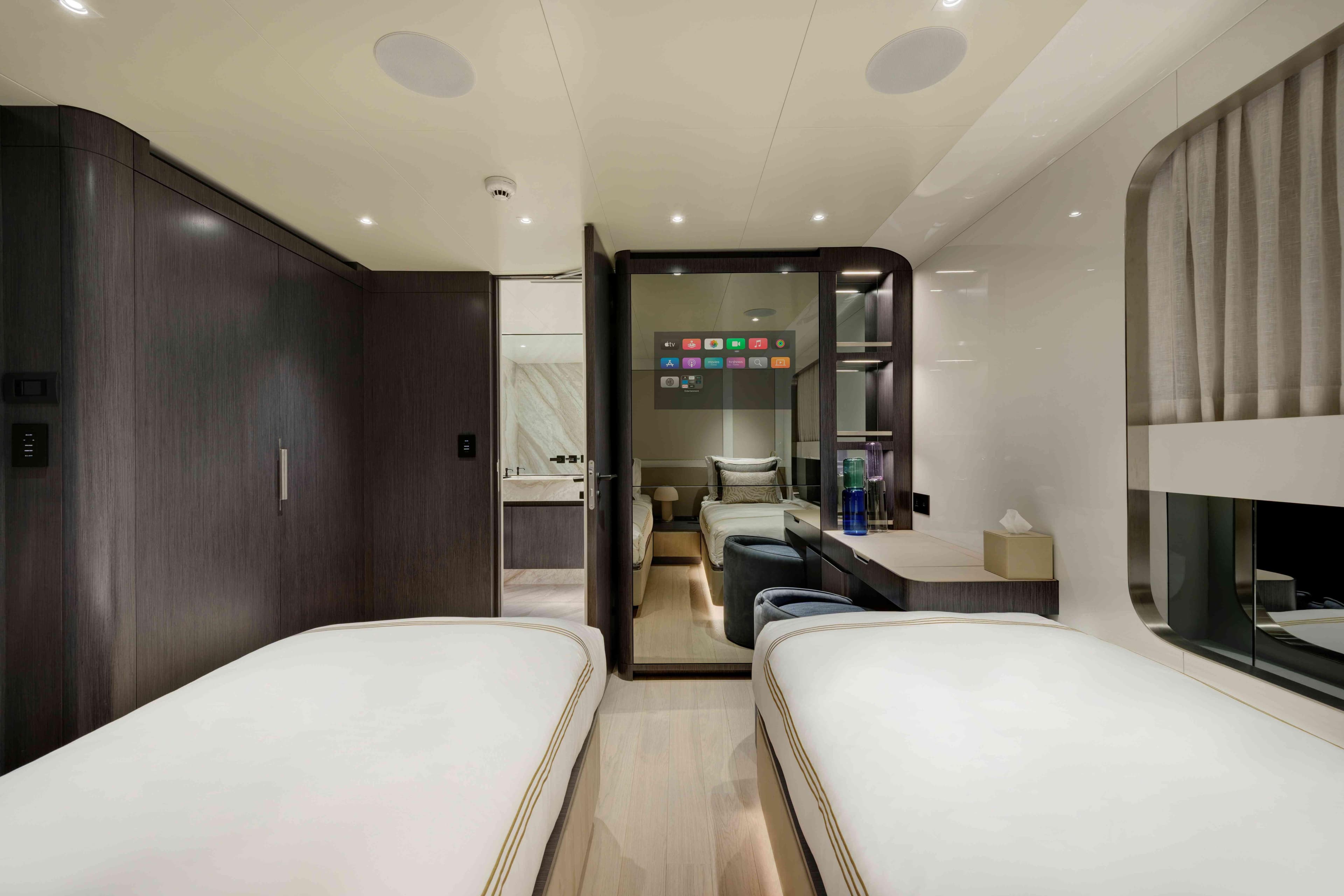 Luxurious interior of Ada Yacht 50 Z - 2025, featuring modern twin beds and sleek design.