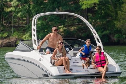 2026 Yamaha Boats 195S with family enjoying a sunny day on the water.
