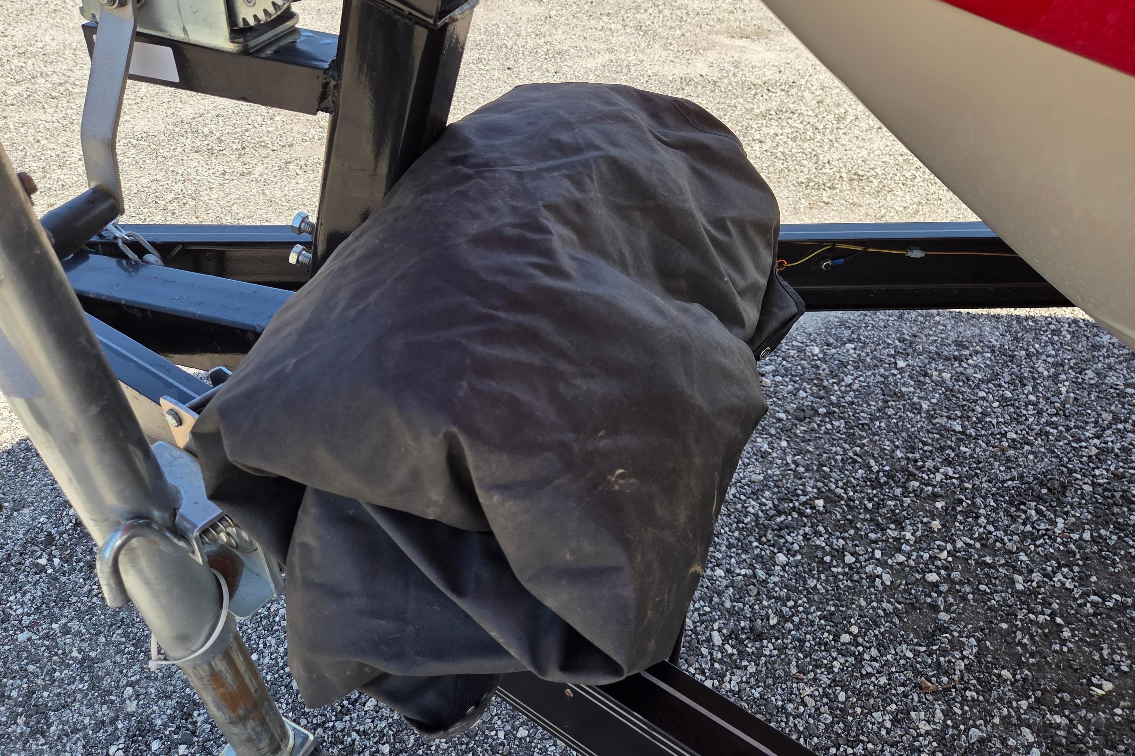 Boat trailer with protective cover, Starcraft Limited Runabout 172 OB Sport, 2020 model.