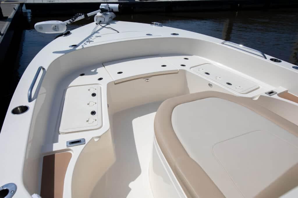 Manufacturer Provided Image: 2025 Scout 231 XSB boat interior with seating and storage compartments.