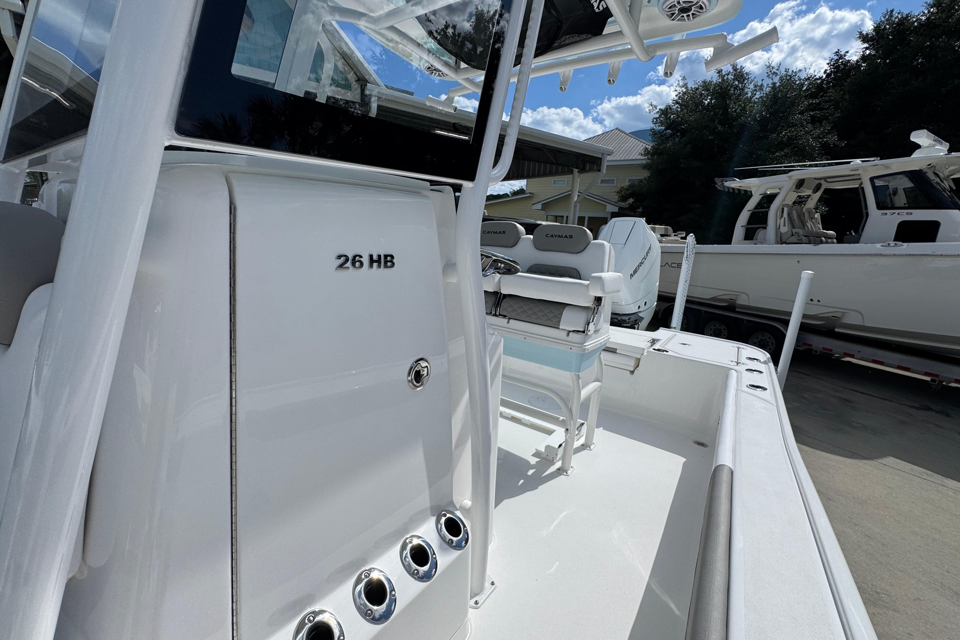 2026 Caymas 26 HB boat with sleek white design and modern features.