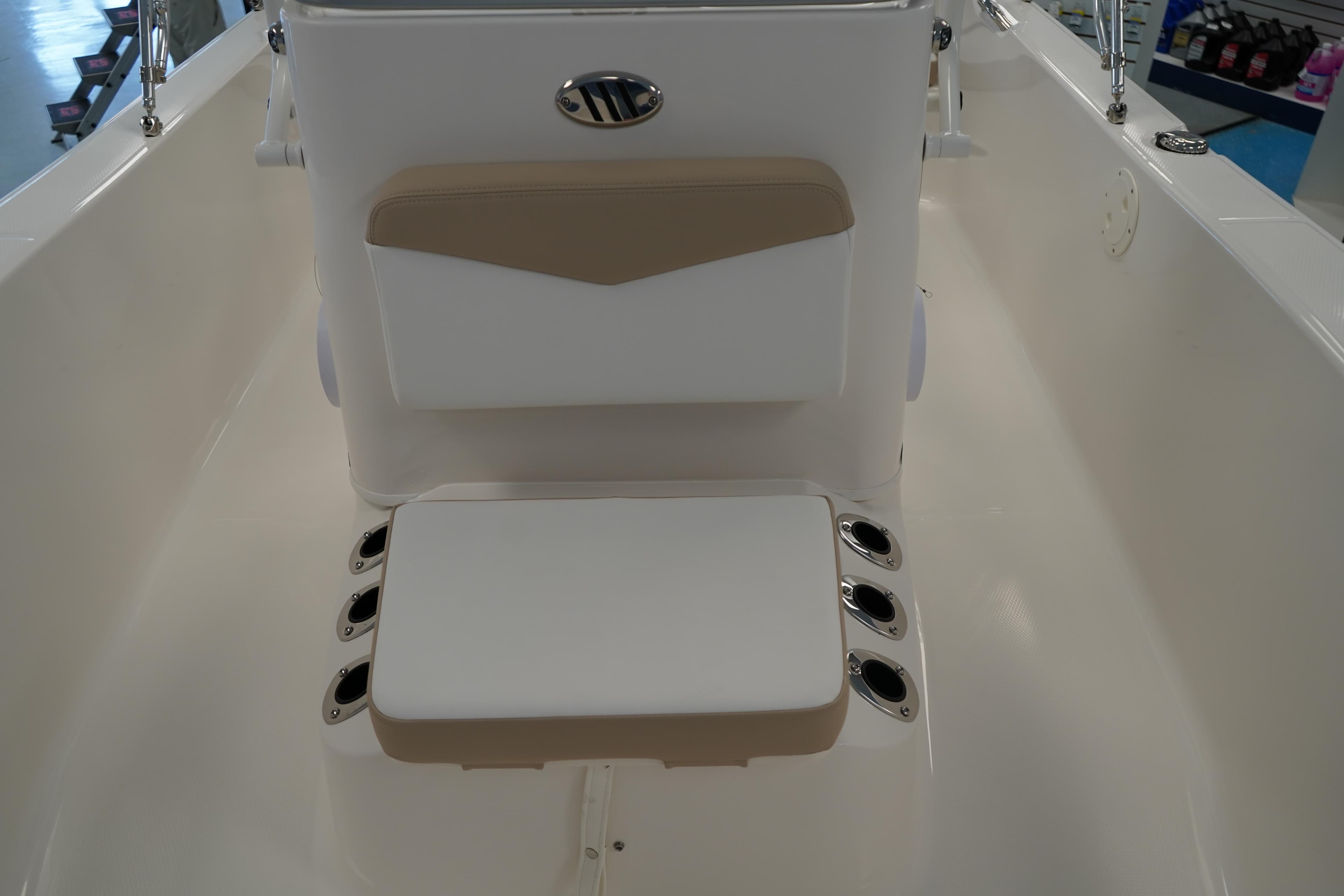 2026 Robalo R160 Center Console boat interior with cushioned seating and rod holders.