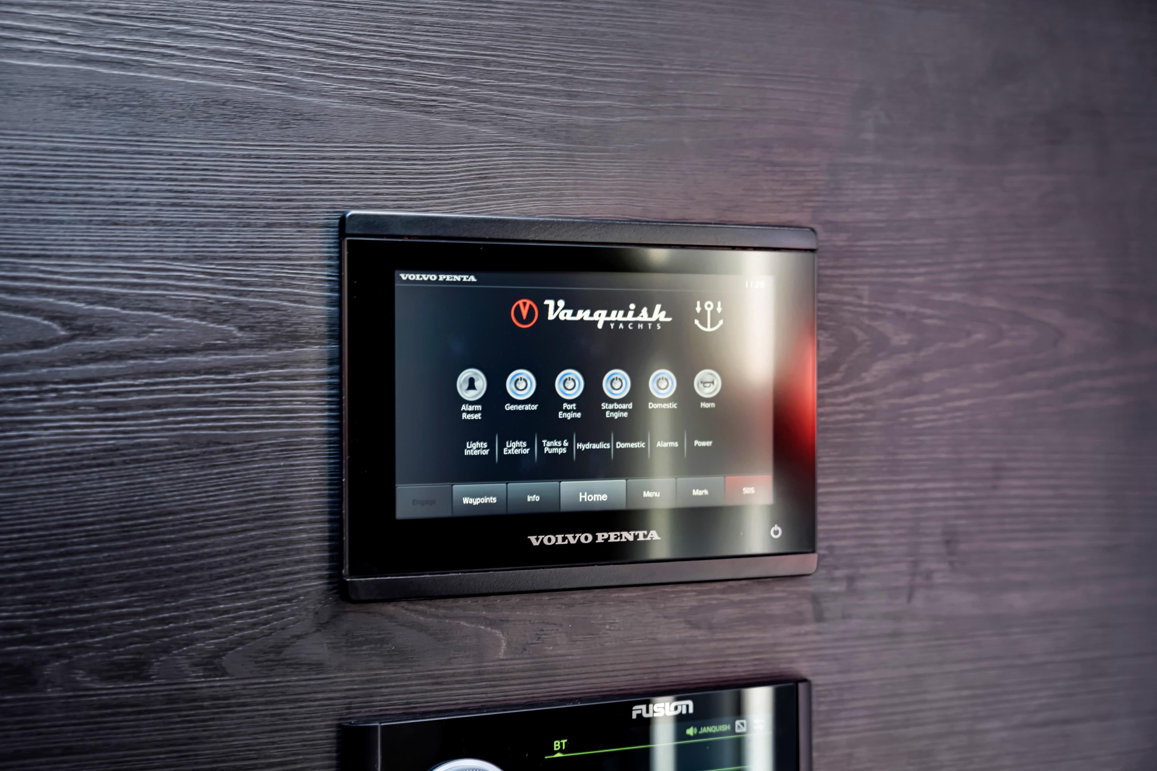 Touchscreen control panel on 2021 Vanquish Yachts 45, featuring Volvo Penta interface.