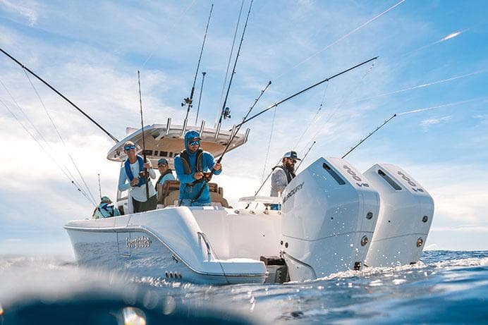 Manufacturer Provided Image: 2025 Everglades 315 Center Console boat with anglers fishing in open water.