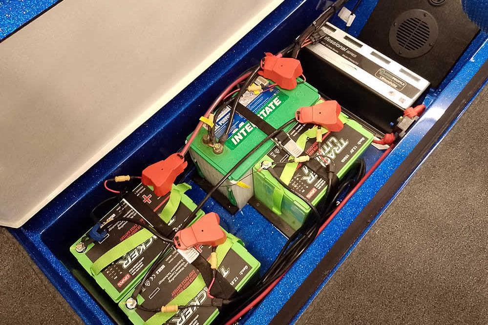 Battery compartment of 2026 Ranger 620FS Cup-Equipped boat with multiple batteries and wiring.