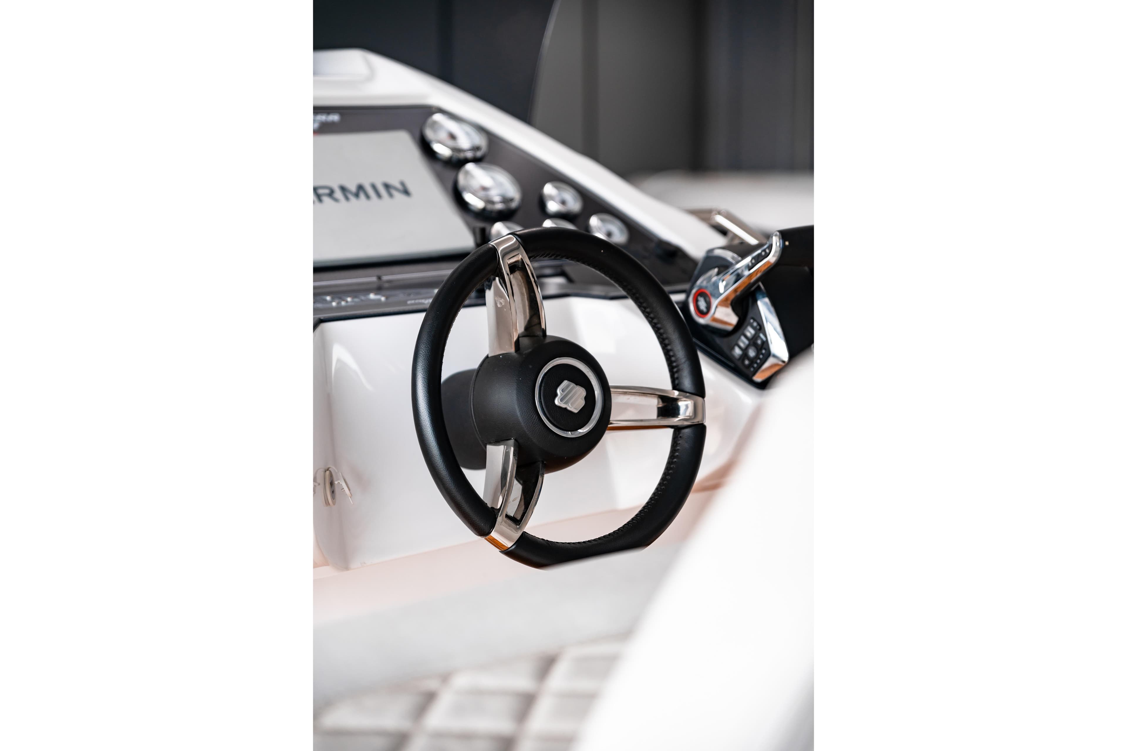 Steering wheel of 2025 Panamera Yacht PY 10 Cabin, featuring modern controls and sleek design.