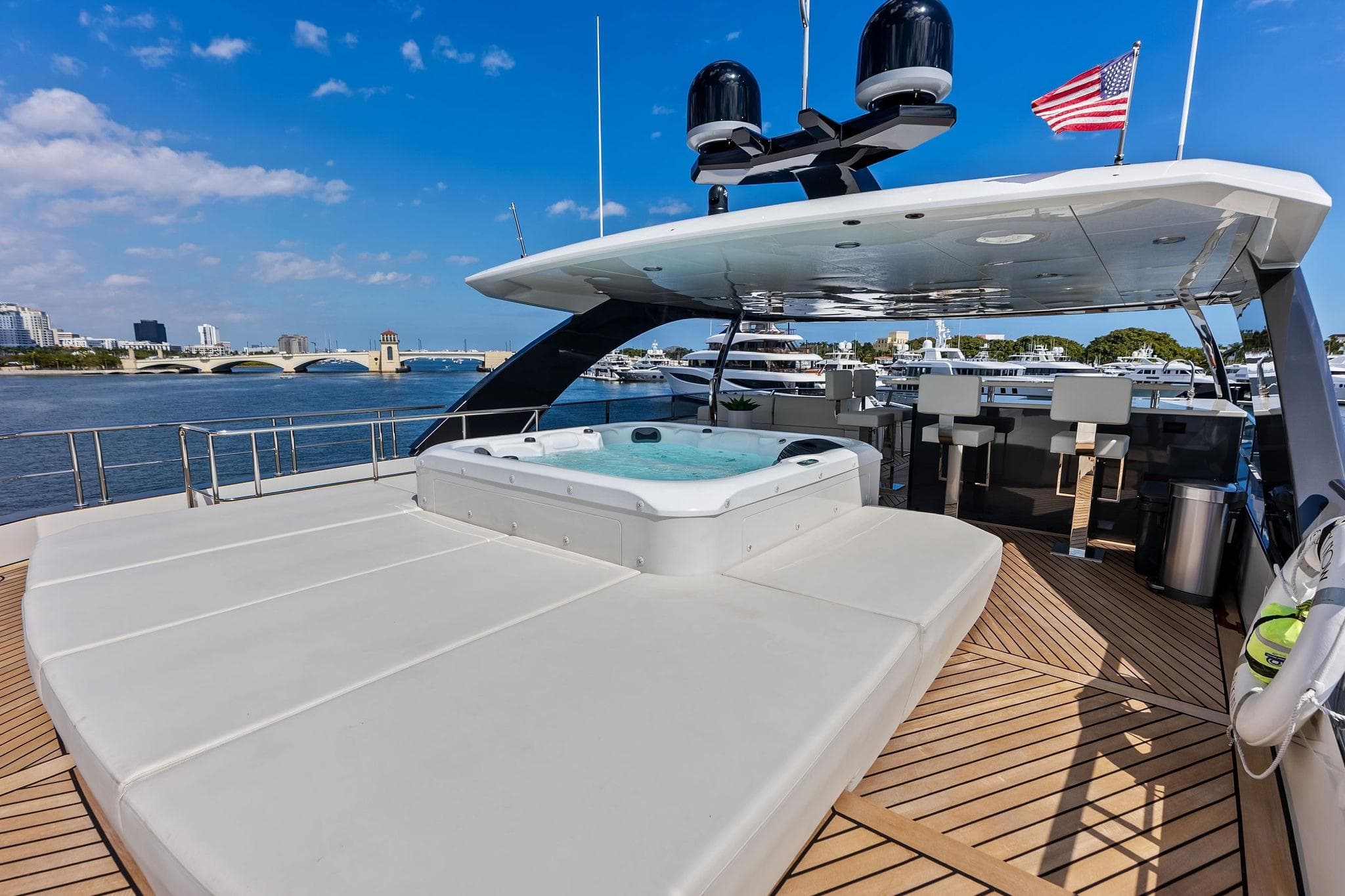Luxurious 2024 Ocean Alexander 35 Revolution yacht with spacious deck and jacuzzi.