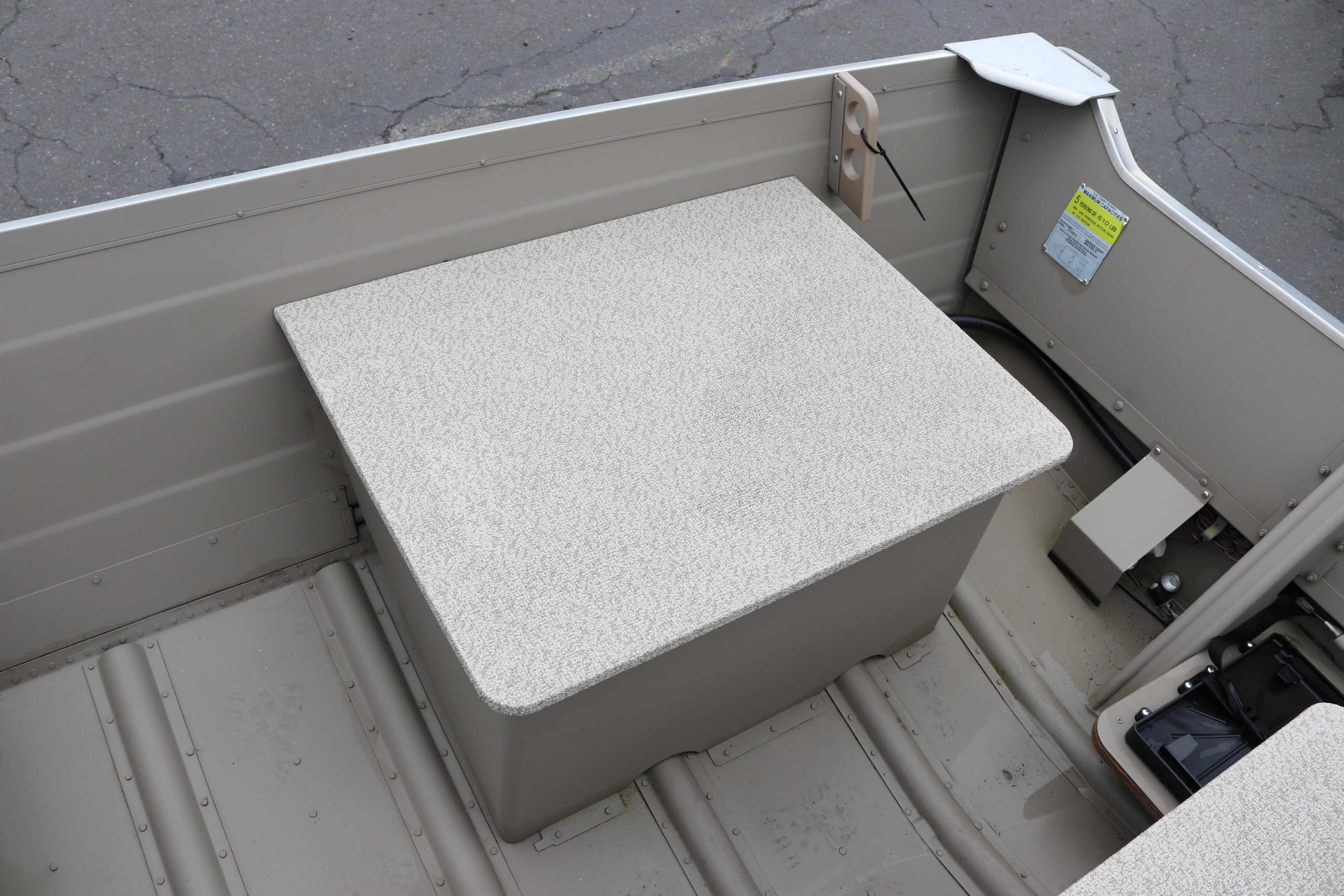 2025 Smoker Craft Voyager 16 boat interior with storage compartment.