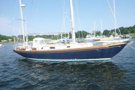 1968 Hinckley Pilot 35 sailboat on calm water.