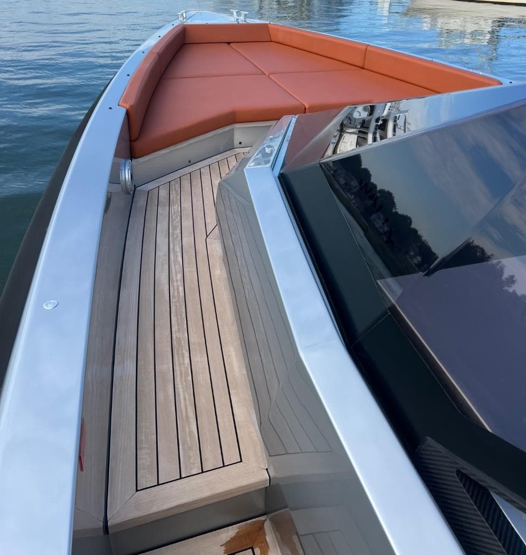 2023 Wally 48 X yacht with sleek deck and orange seating.