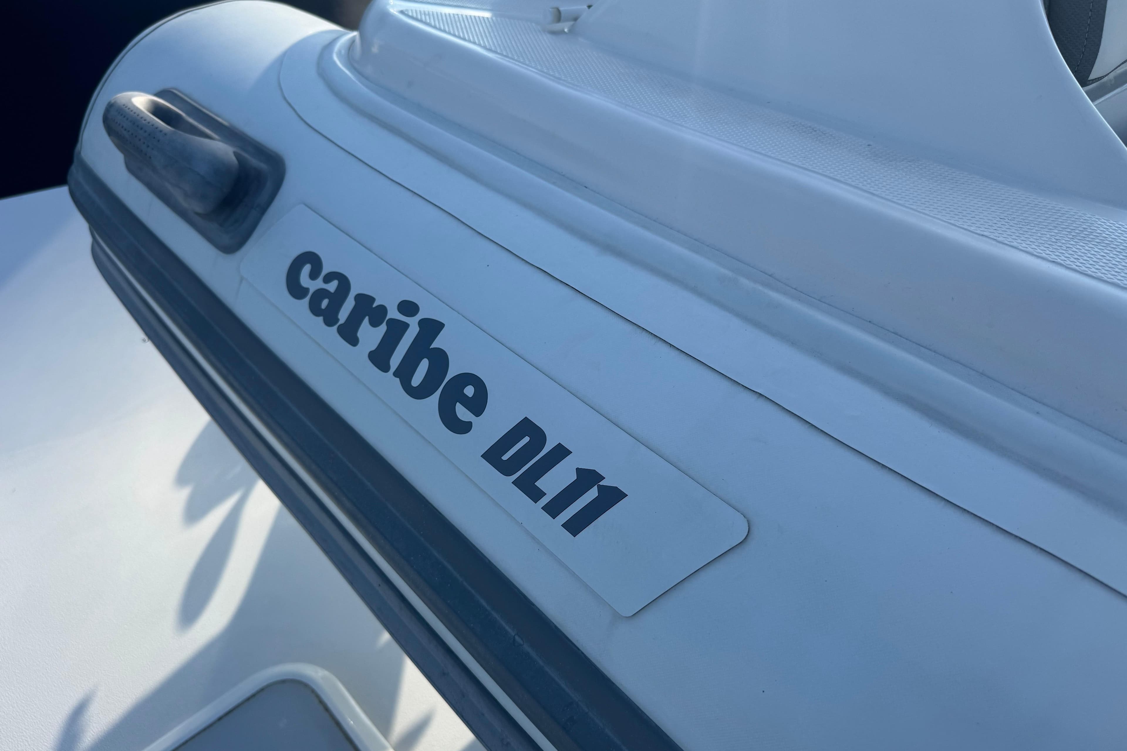 Close-up of Caribe DL11 inflatable boat on 2002 Viking 61 Enclosed Bridge.