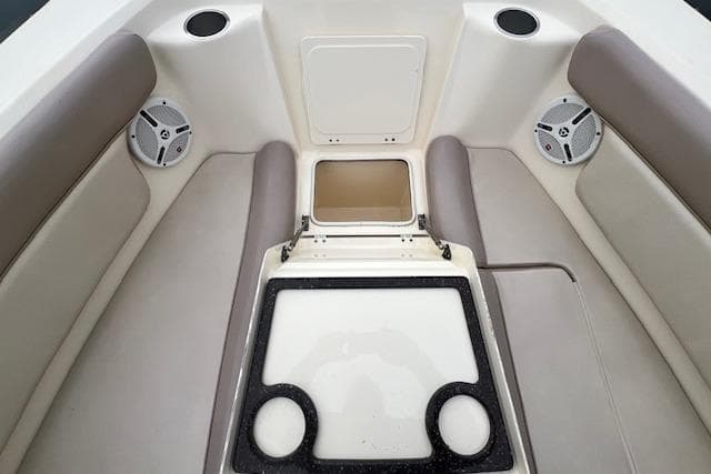 2008 Scout 242 Dorado boat interior with seating and storage compartments.
