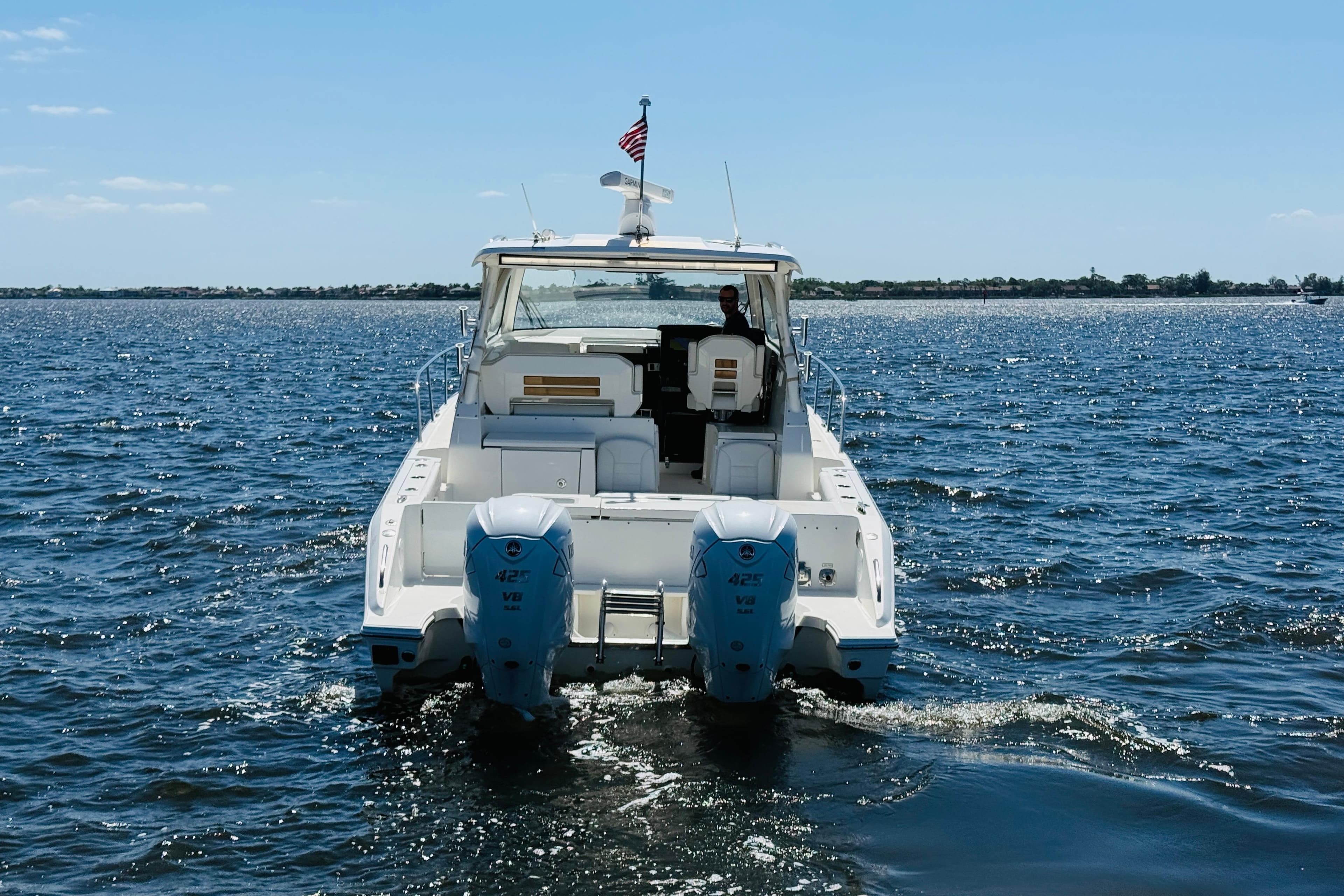 2021 Pursuit OS 355 Offshore boat cruising on open water.