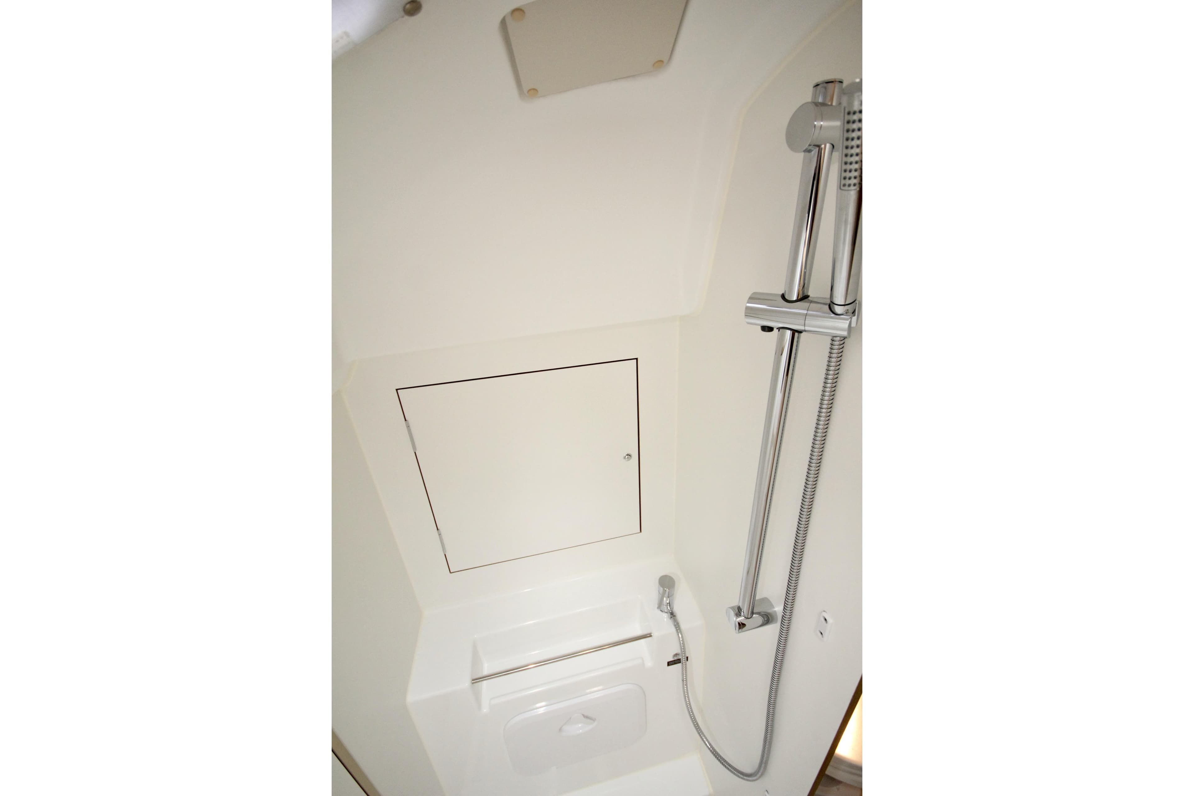 2023 Beneteau Oceanis 34.1 yacht bathroom with modern shower fixtures.