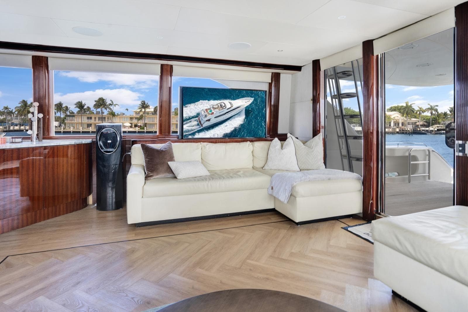 Luxurious 2001 Lazzara Motoryacht interior with elegant seating and scenic ocean view.