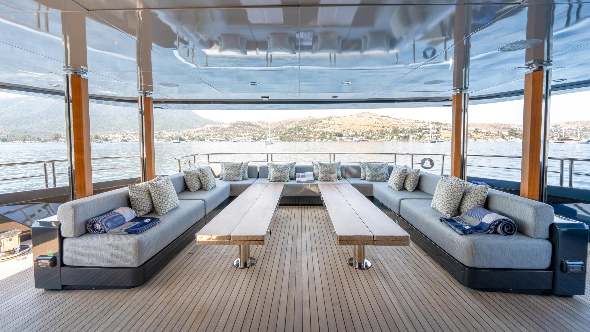 Luxurious Mondomarine 50-metre yacht interior, 2016 model, featuring elegant seating and scenic views.