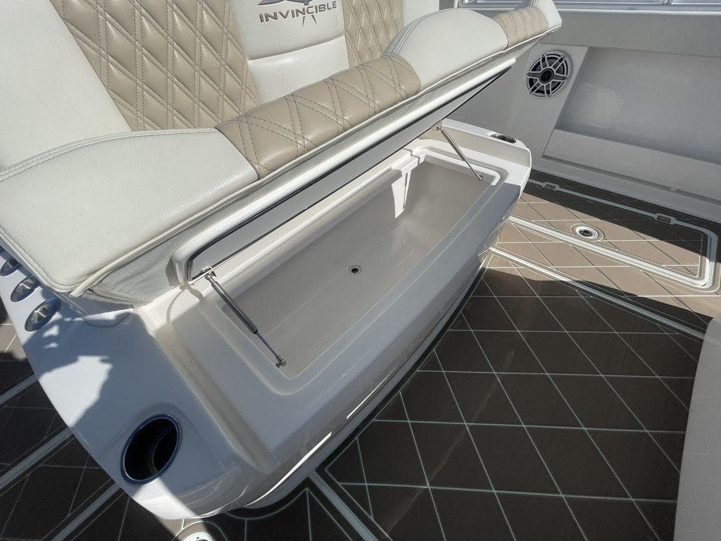 2019 Invincible 40 Catamaran storage compartment and seating area.