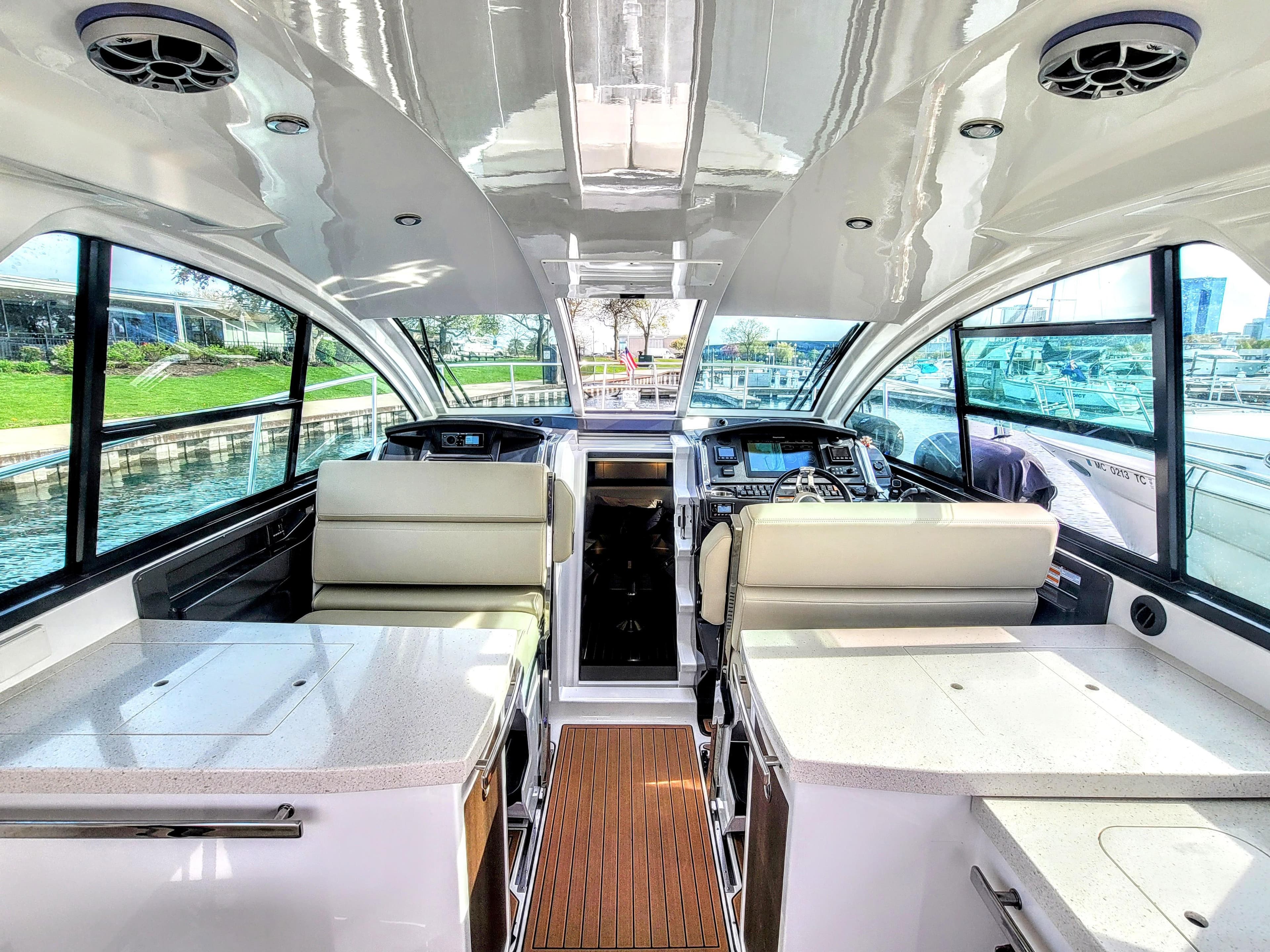 Interior of 2017 Monterey 360 Sport Coupe yacht with modern design and luxurious seating.