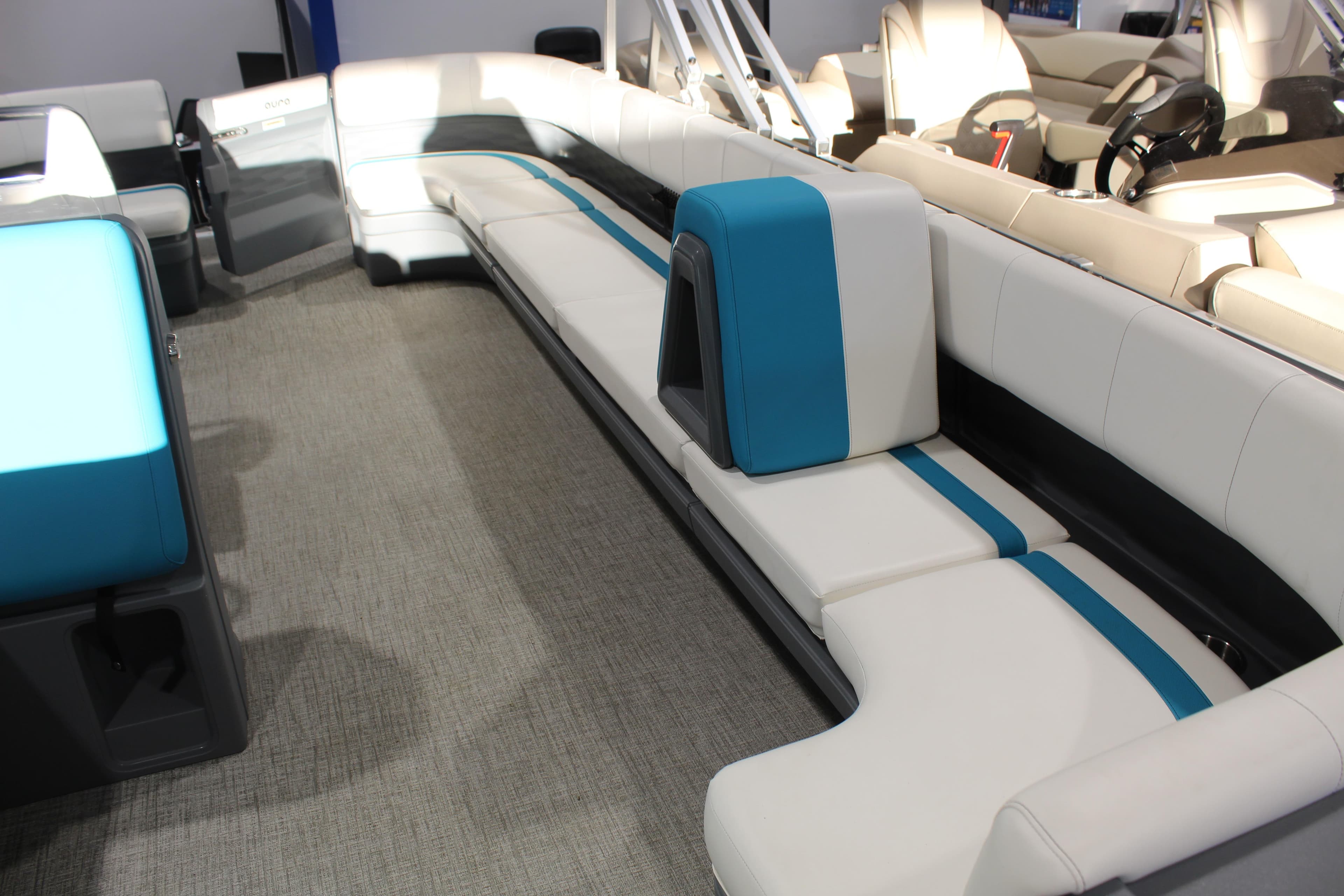 Luxurious seating on 2025 Avalon 2185 25 AURA QL pontoon boat, featuring modern design.